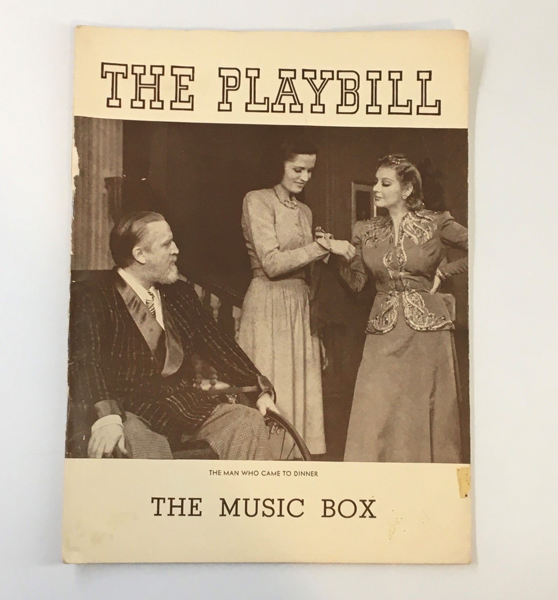 Cover of the 1939 Playbill for 'The Music Box' featuring 'The Man Who Came To Dinner' with a vintage photograph of cast members.