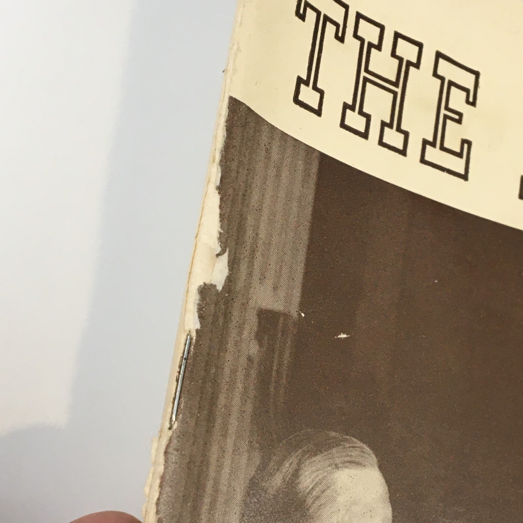 Side view of the 1939 Playbill for 'The Music Box' highlighting wear and tear near the title area.