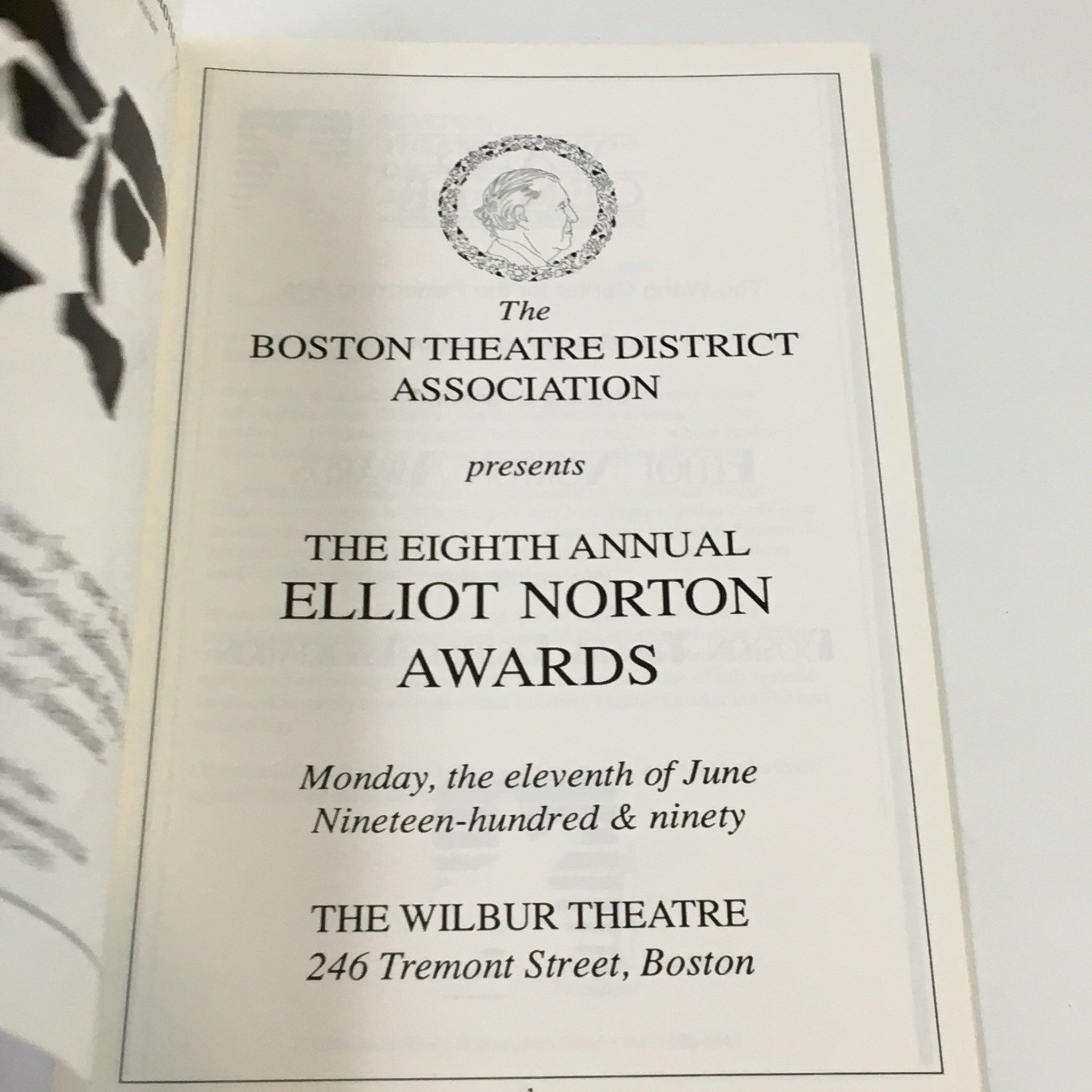 Inside page of the 1990 Wilbur Theatre The Eight Annual Elliot Norton Awards program detailing the event date and location at 246 Tremont Street, Boston.