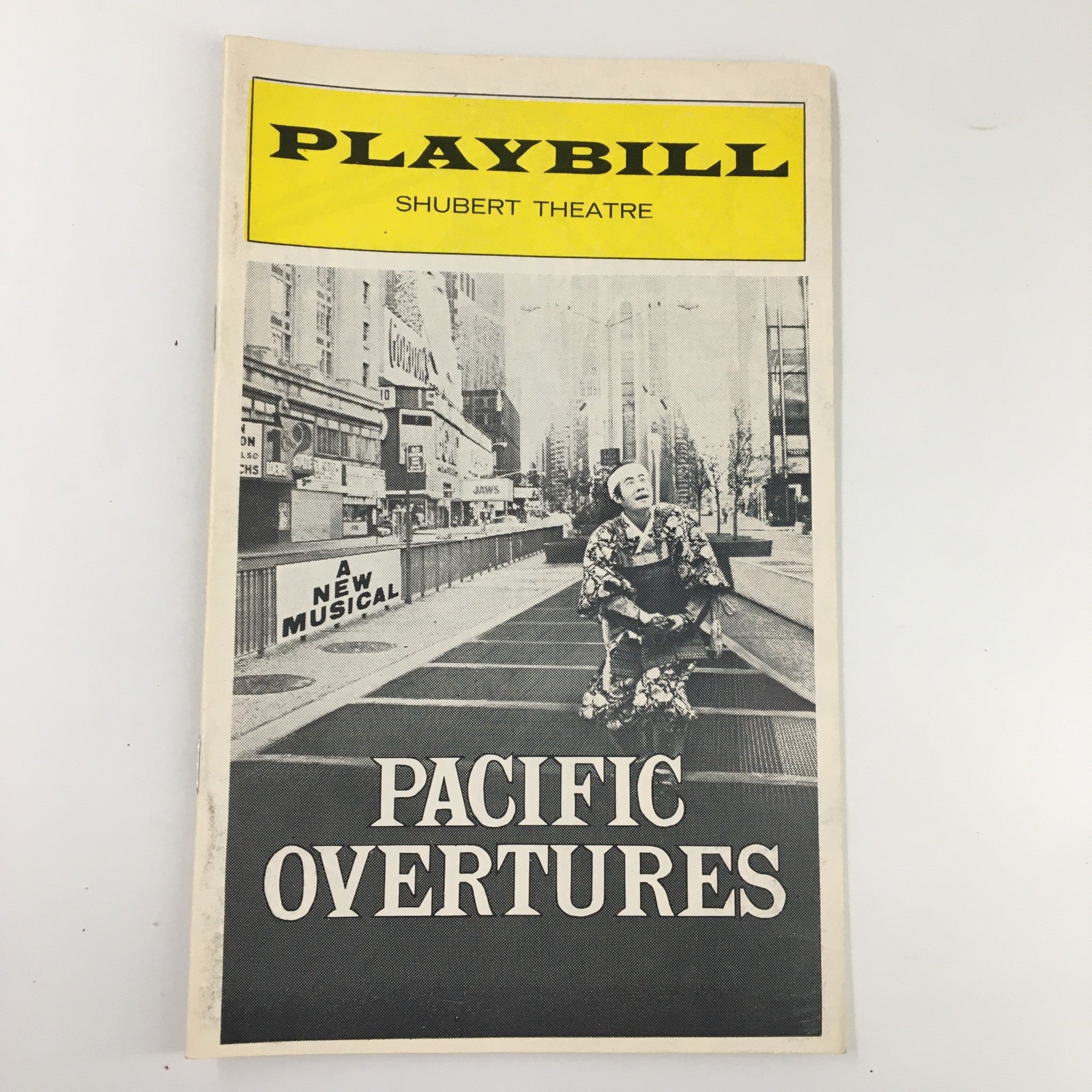 Cover of the 1975 Playbill for Pacific Overtures at Shubert Theatre featuring a theatrical image and bold title.
