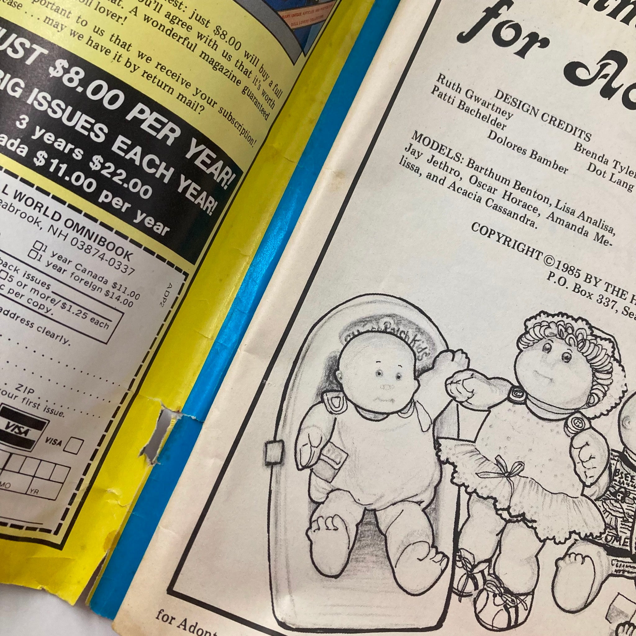 Inside page of VTG Doll World Magazine 1985 #2 showing subscription details and a sketch of dolls, highlighting creativity in doll fashion.