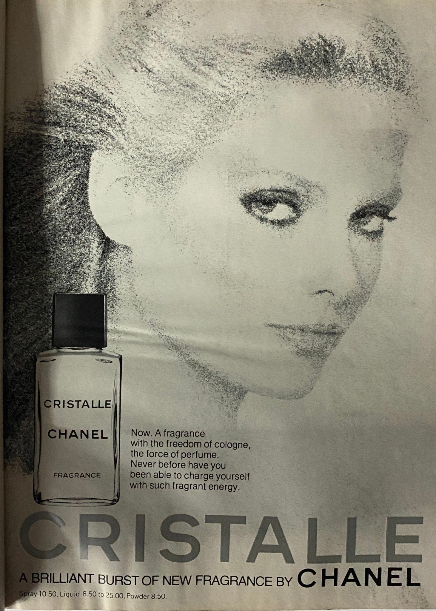 Advertisement for Cristalle perfume by Chanel featured in Vogue Magazine October 1977, emphasizing its unique fragrance qualities.