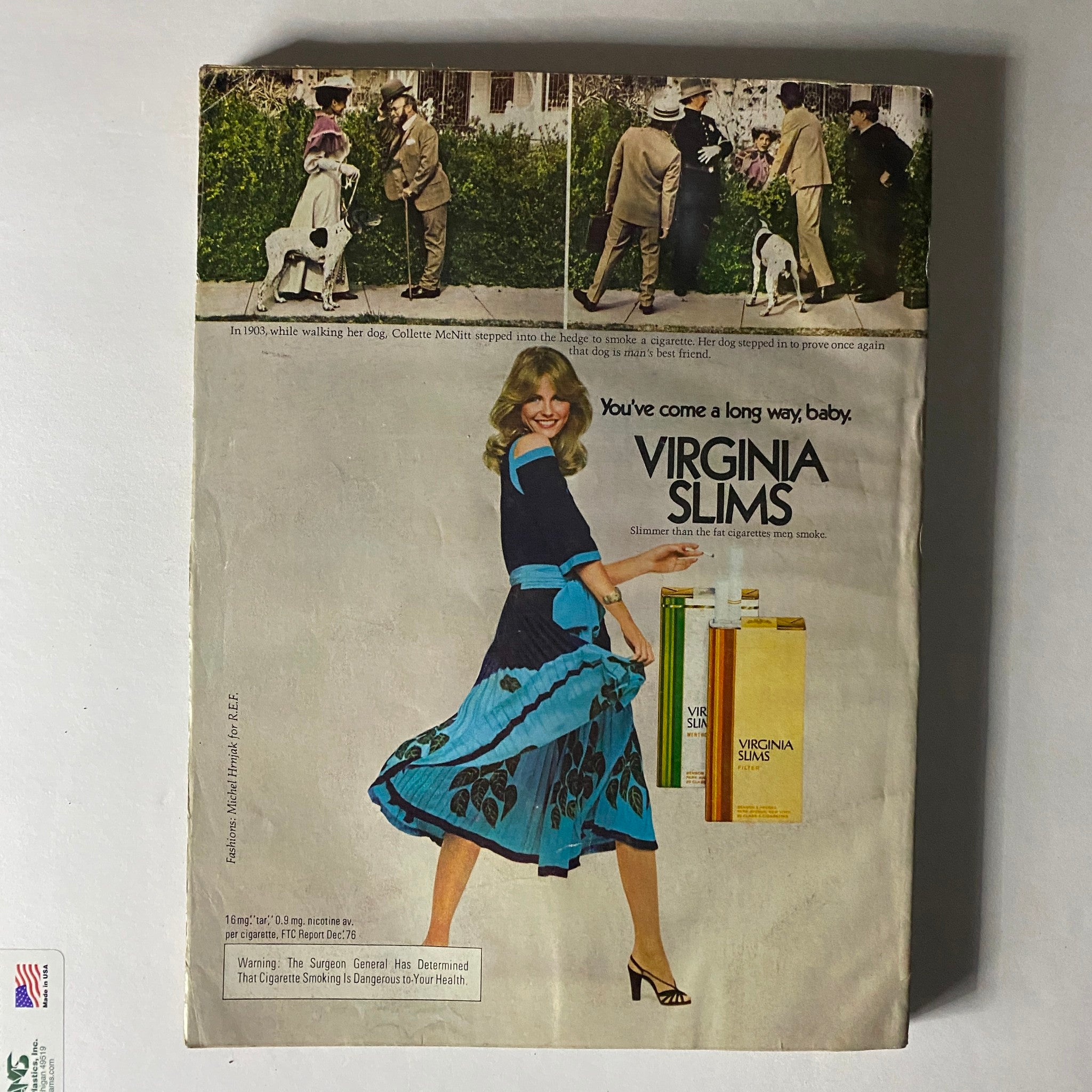 Vintage advertisement from Vogue Magazine October 1977 featuring a woman in a stylish blue and black dress promoting Virginia Slims cigarettes, showcasing fashion trends of the 1970s.
