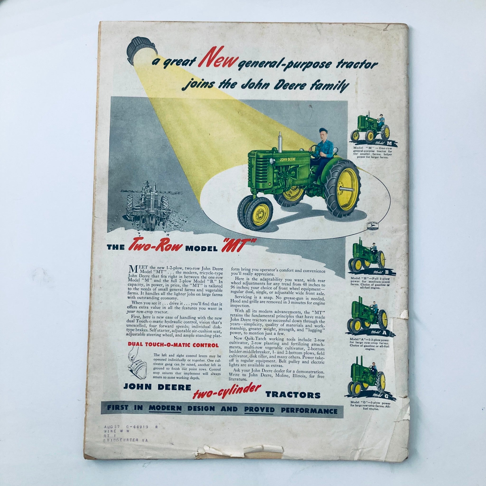 Advertisement for the new John Deere model MT tractor in VTG The Progressive Farmer Magazine December 1949, showcasing agricultural advancements.