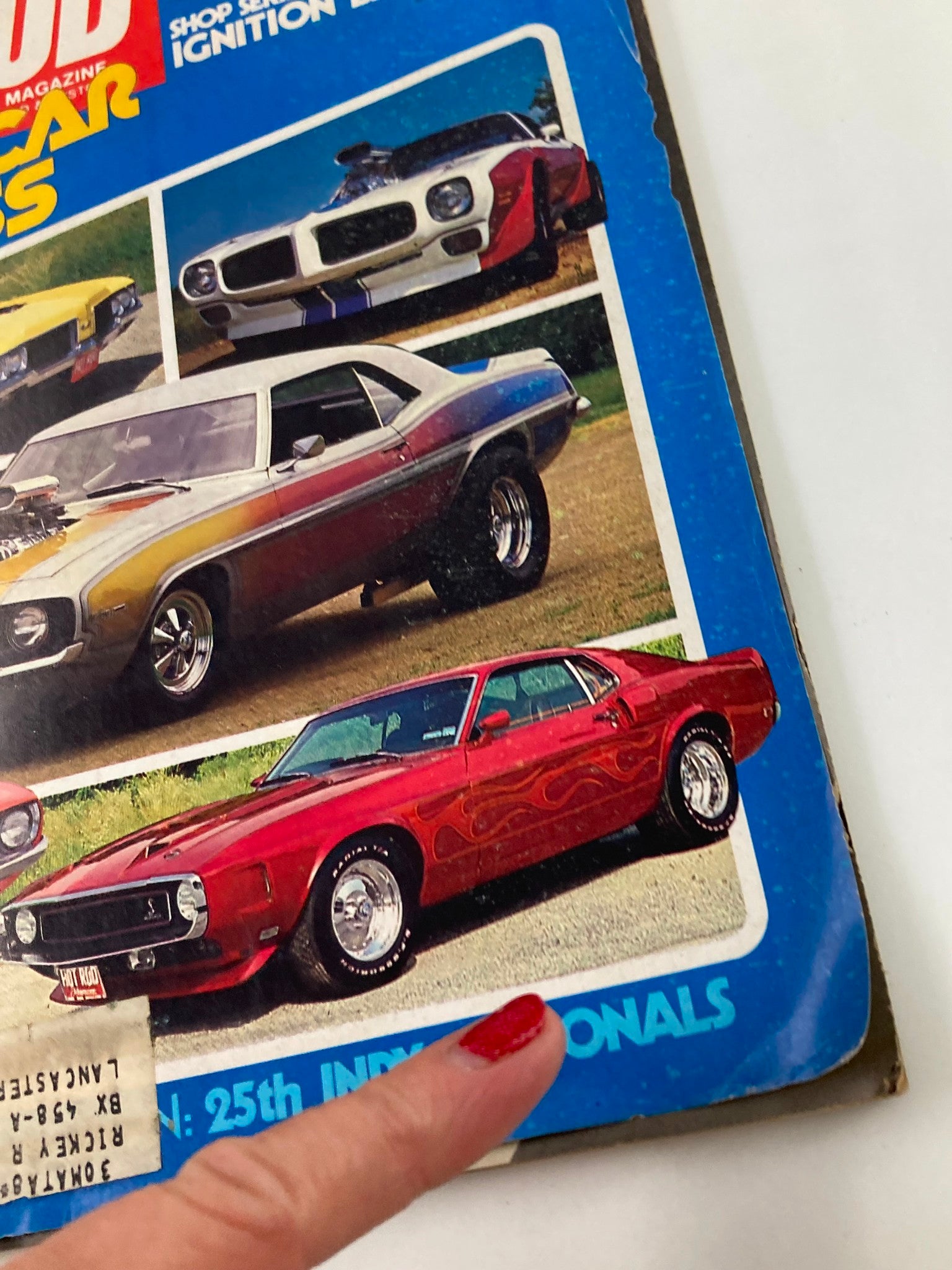 Close-up of the VTG Hot Rod Magazine November 1979 Vol 32 #11 cover highlighting a red muscle car and details about the 25th Indy Nationals event.