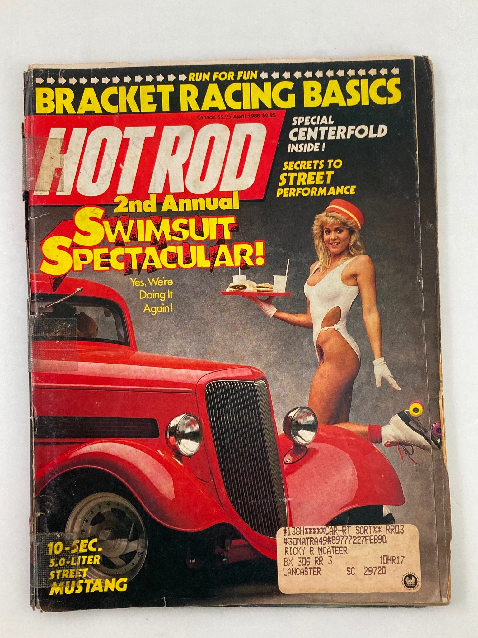 Hot Rod Magazine April 1988 Vol 41 #4 featuring Kim Neumann Three-Window '34 Ford on the cover with a model in a swimsuit holding a tray, showcasing classic automotive culture.