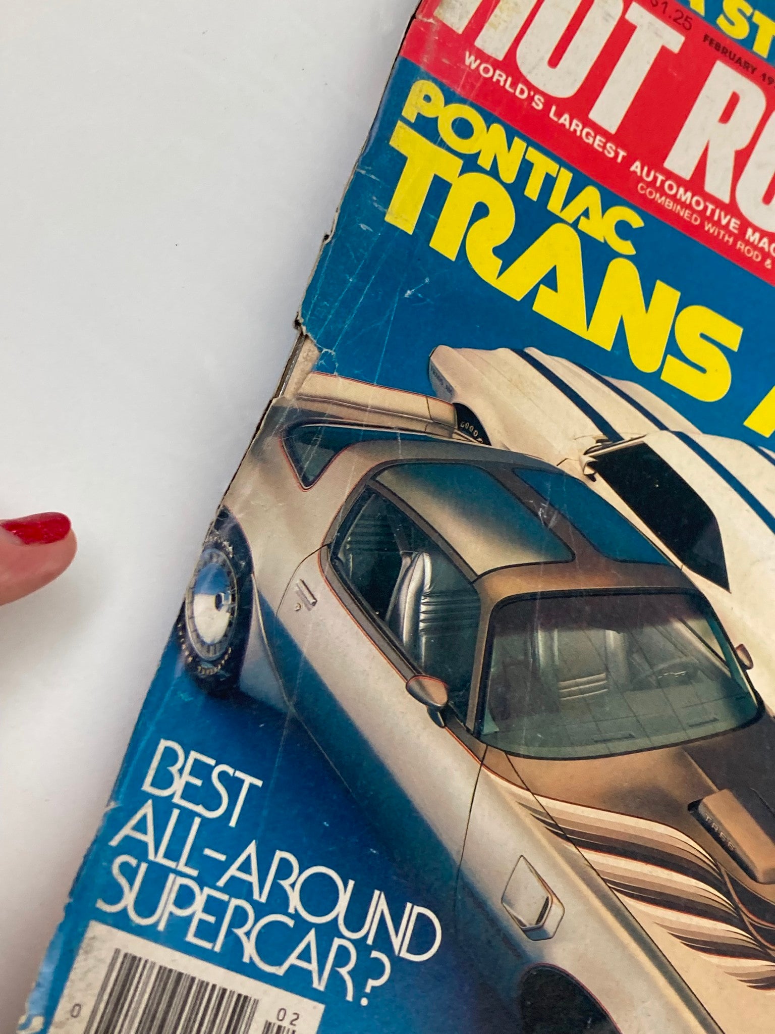 Close-up of the cover of VTG Hot Rod Magazine February 1979 Vol 32 #2 showcasing Pontiac Trans Am with text asking if it's the best all-around supercar.
