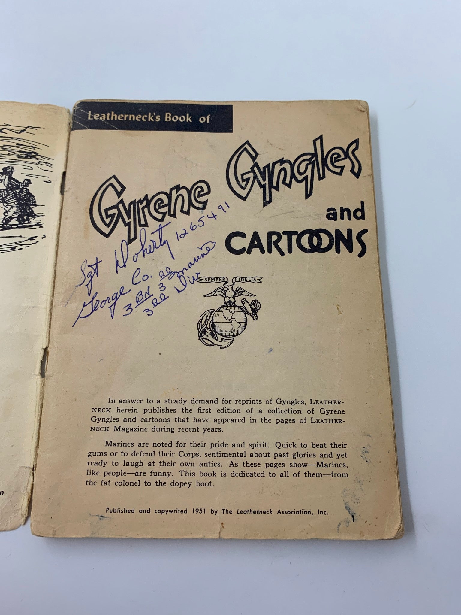 Cover page of 1951 Leatherneck's Book of Gyrene Gyngles and Cartoons announcing gyrene gyngles and cartoons, featuring handwritten notes from a previous owner.