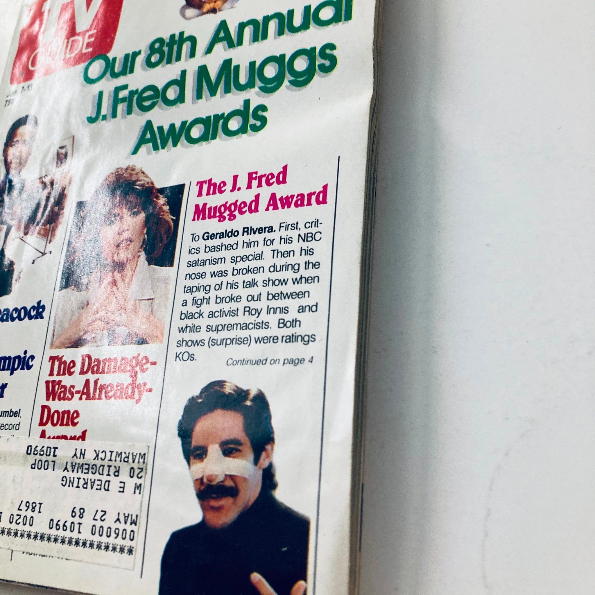 Close-up view of the TV Guide Magazine January 7 1989, showcasing details about the J. Fred Mugged Award featuring Gerald Rivera and commentary on ratings.