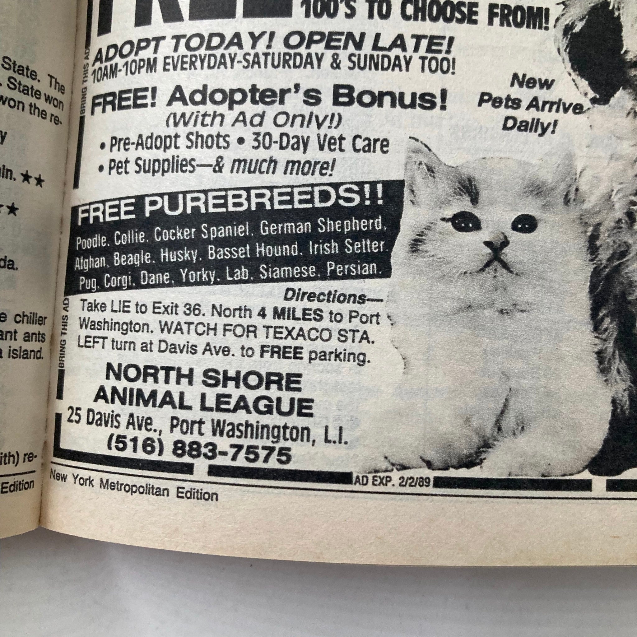 Inside page from TV Guide Magazine January 14, 1989 showing an advertisement for the North Shore Animal League, highlighting available purebred pets and adoption details.