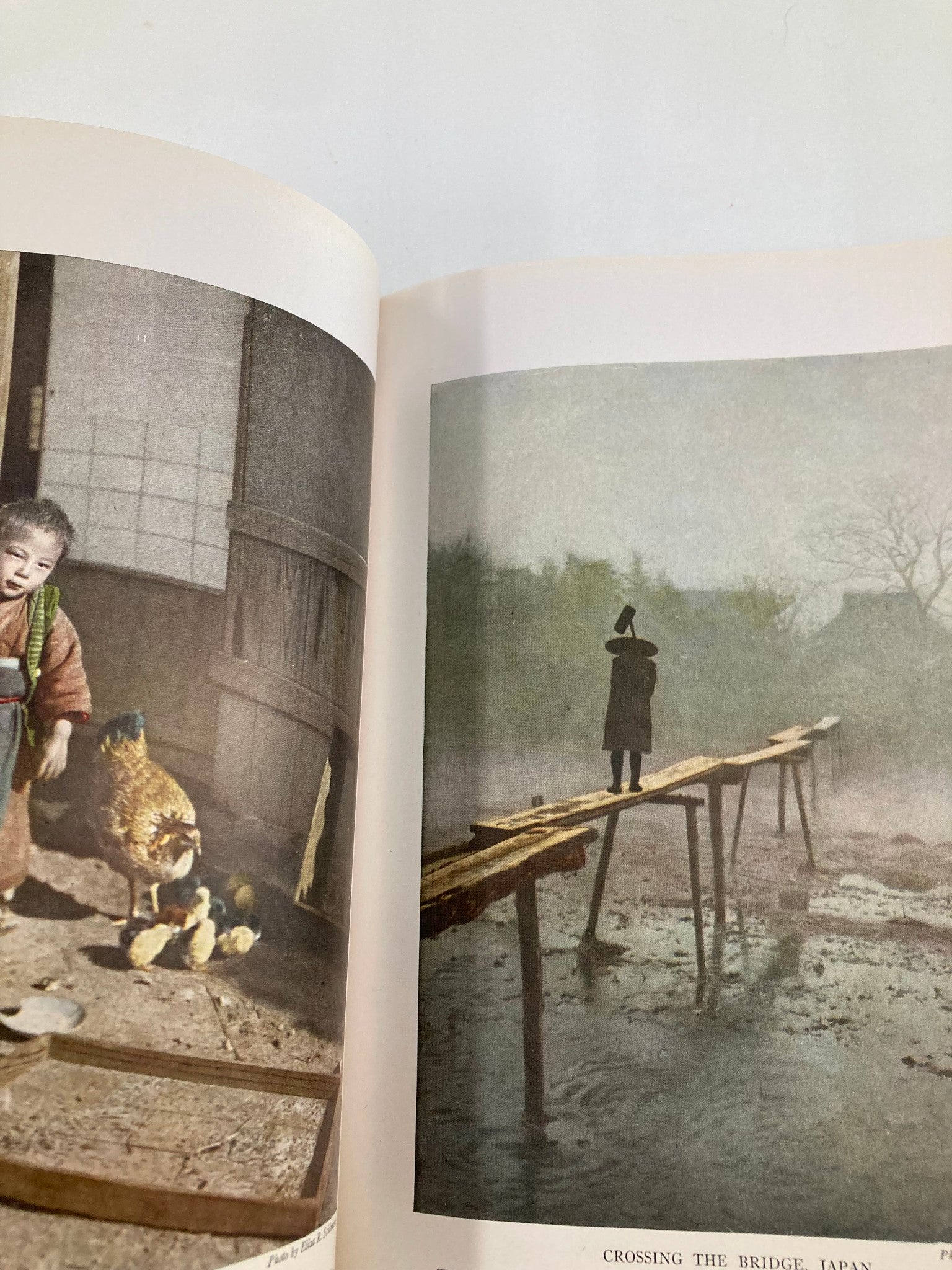 Inside the VTG National Geographic Magazine July 1914, depicting a child with chickens, emphasizing rural life and picturesque landscapes in Japan.