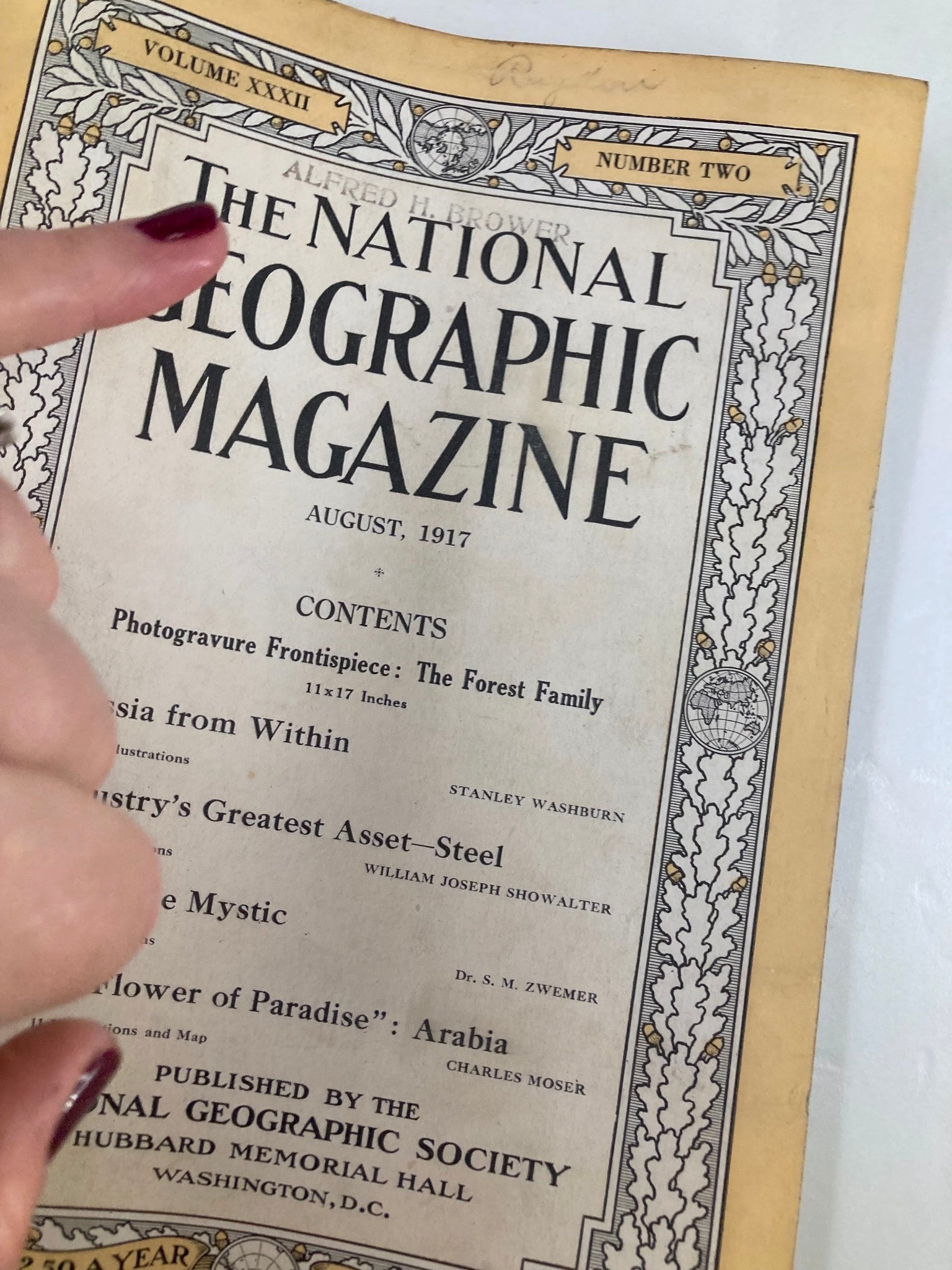 Close-up view of The National Geographic Magazine August 1917 cover, highlighting the title and contents such as 'Russia from Within' by Stanley Washburn.