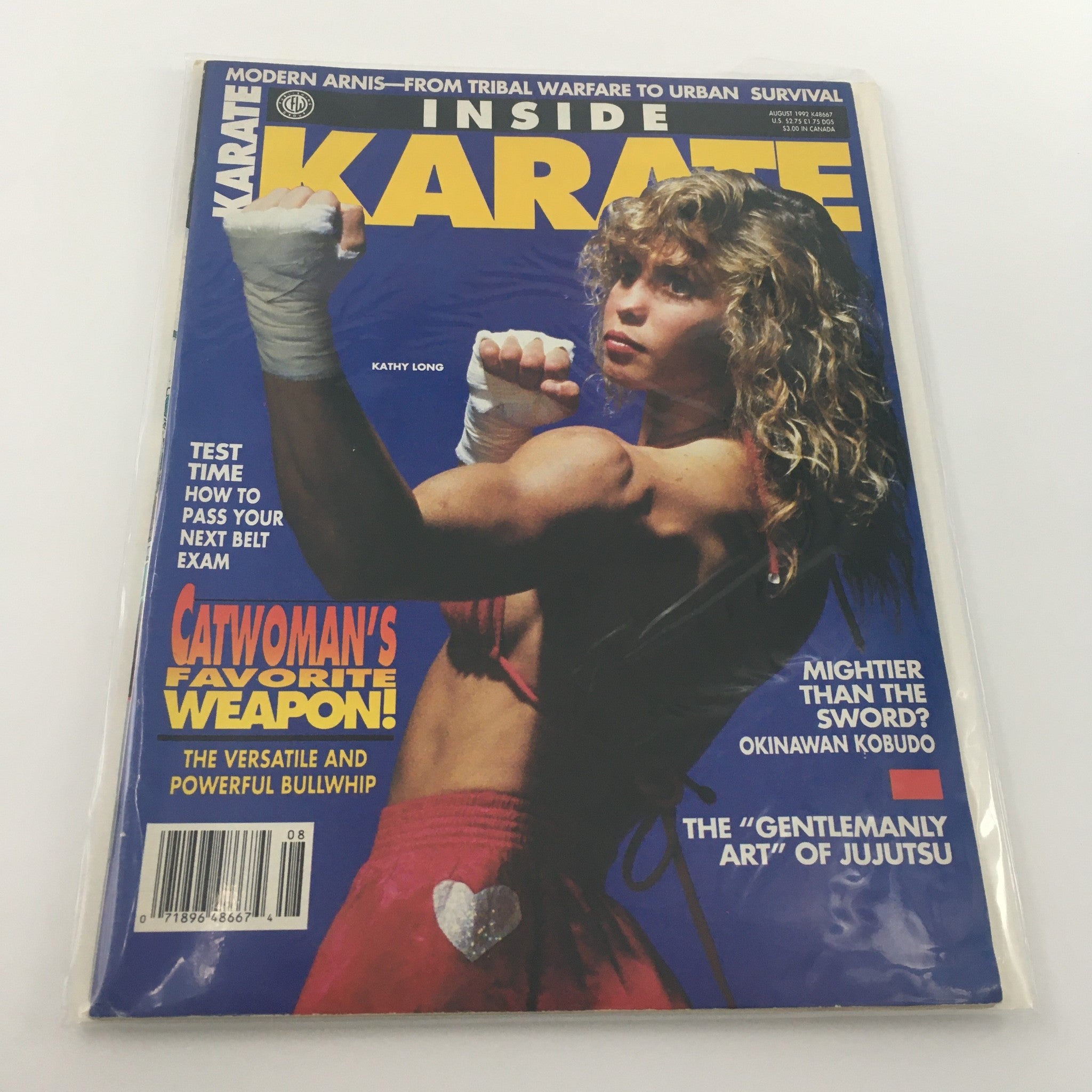 Cover of Inside Karate Magazine August 1992 featuring Kathy Long, with the headline 'Catwoman's Favorite Weapon!' showcasing a martial arts theme.