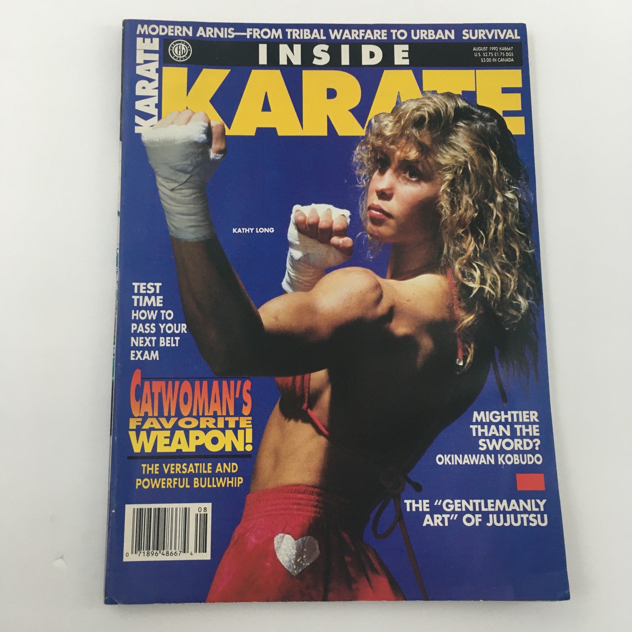 Cover image of Inside Karate Magazine August 1992 featuring Kathy Long, emphasizing 'Catwoman's Favorite Weapon!' illustrating martial arts excitement.