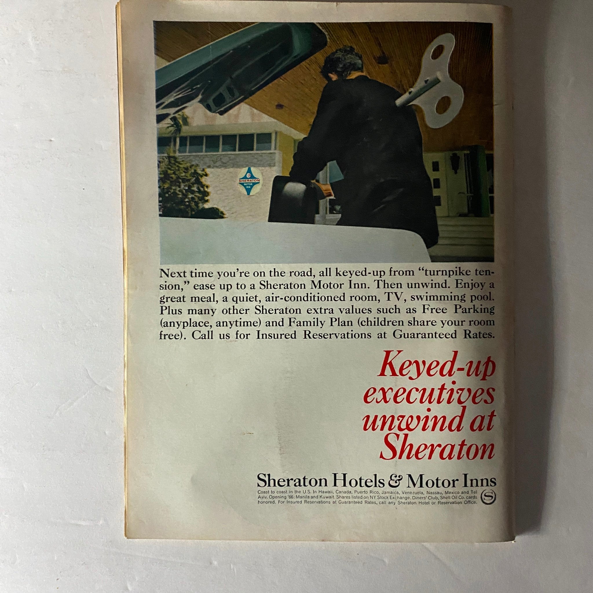 Vintage advertisement from Time Magazine April 22, 1966, Vol 87, No. 16 featuring Thich Tri Quang, promoting Sheraton Hotels & Motor Inns with a man unloading luggage from a car at an Inn's entrance.