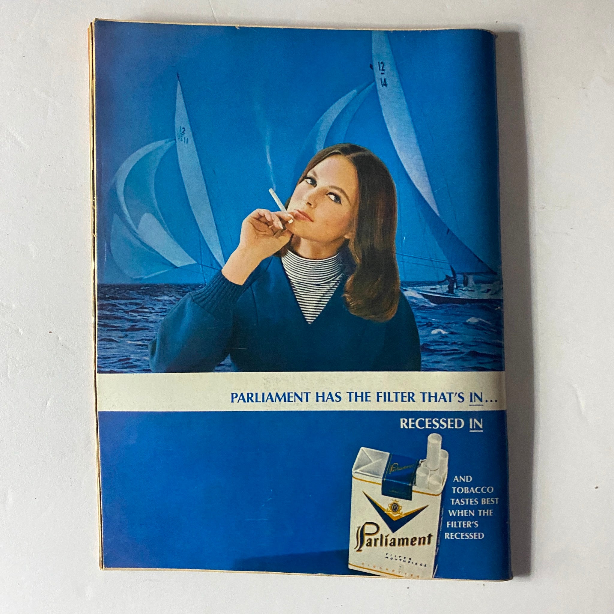 Back cover advertisement of the Time Magazine April 29, 1966, Vol 87, No. 17 featuring a woman smoking a cigarette, advertising Parliament cigarettes.