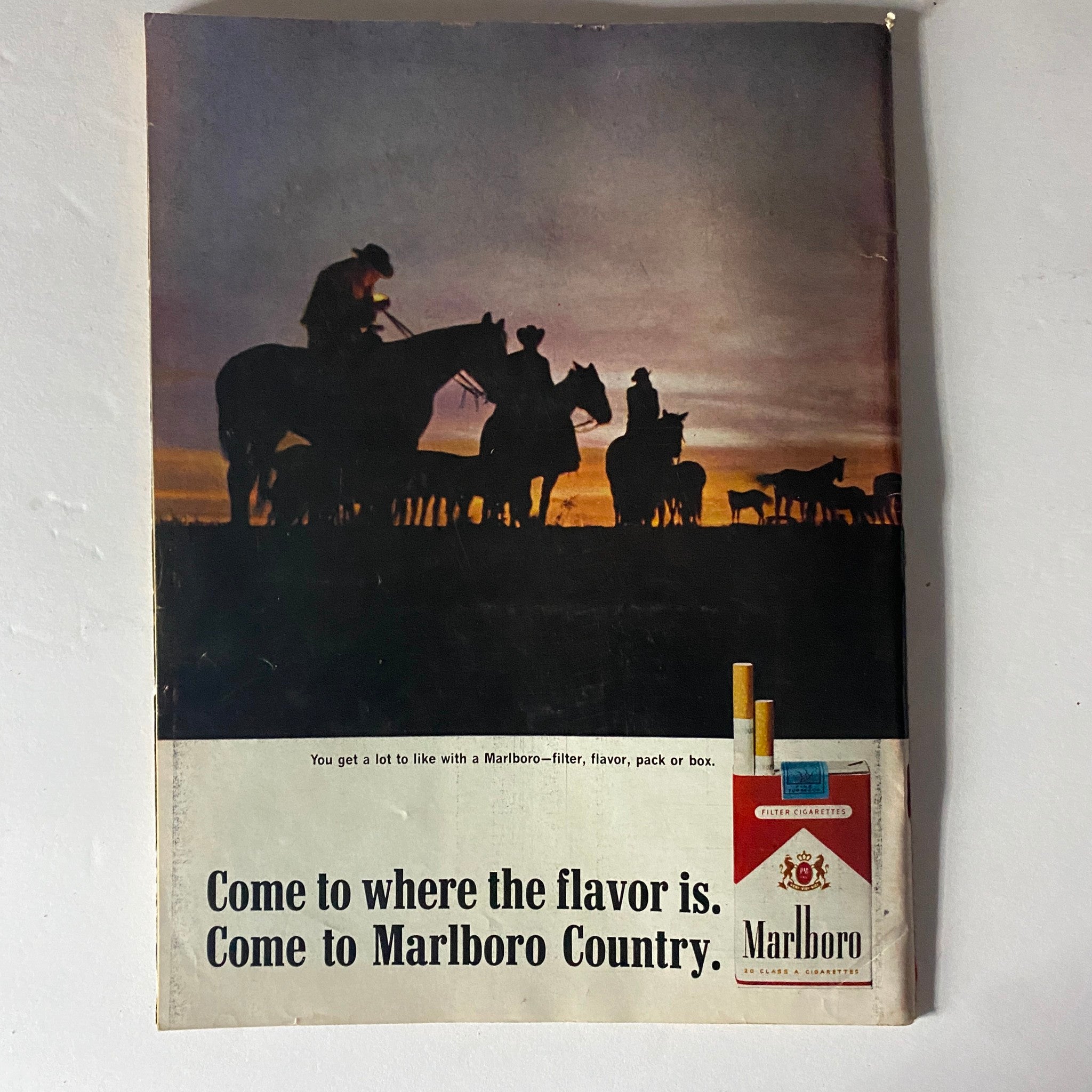 Advertisement page from Time Magazine July 8 1966, Vol 88 No. 2 showcasing a Marlboro Country theme and highlighting Marlboro cigarettes.