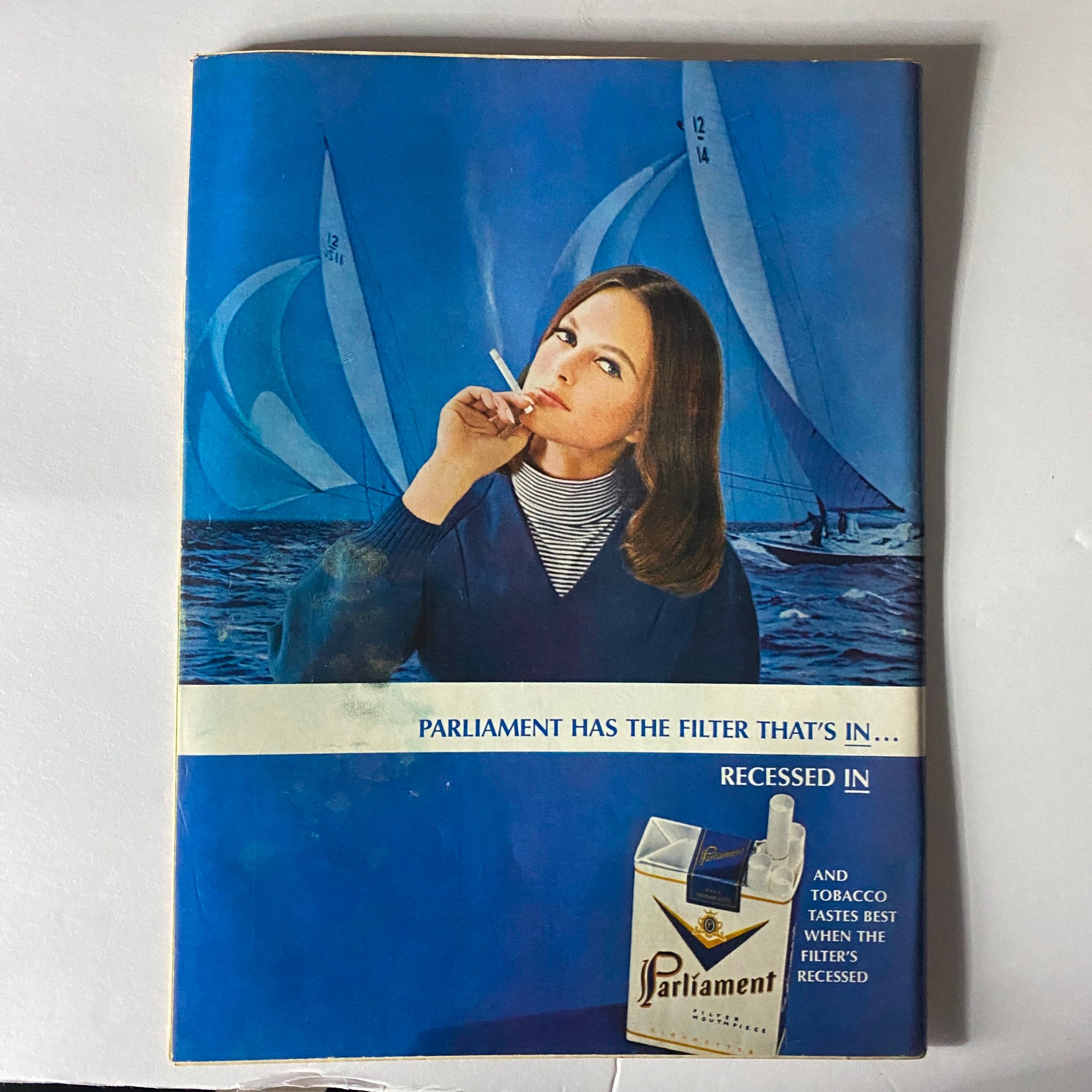 Advertisement page from Time Magazine August 26, 1966, featuring a woman holding a cigarette in front of sailboats, promoting Parliament cigarettes with the tagline about its unique filter.