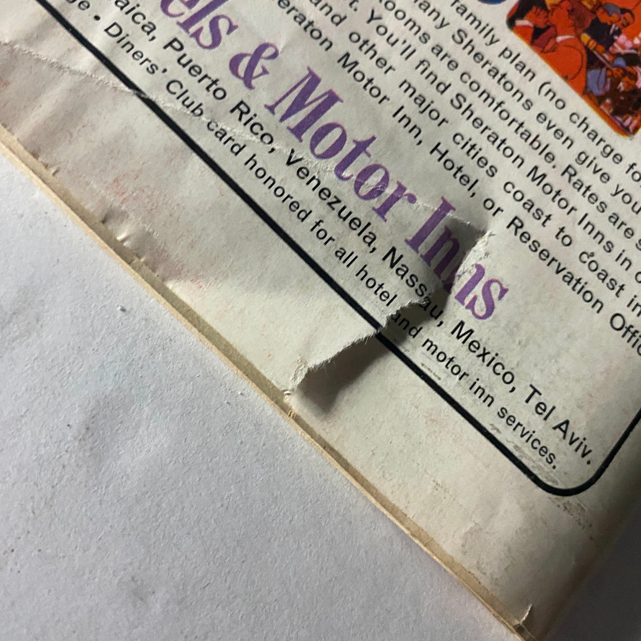 Close-up view of an advertisement from the back cover of Time Magazine February 21, 1964, showcasing details about Sheraton Hotels and Motor Inns, with visible wear.