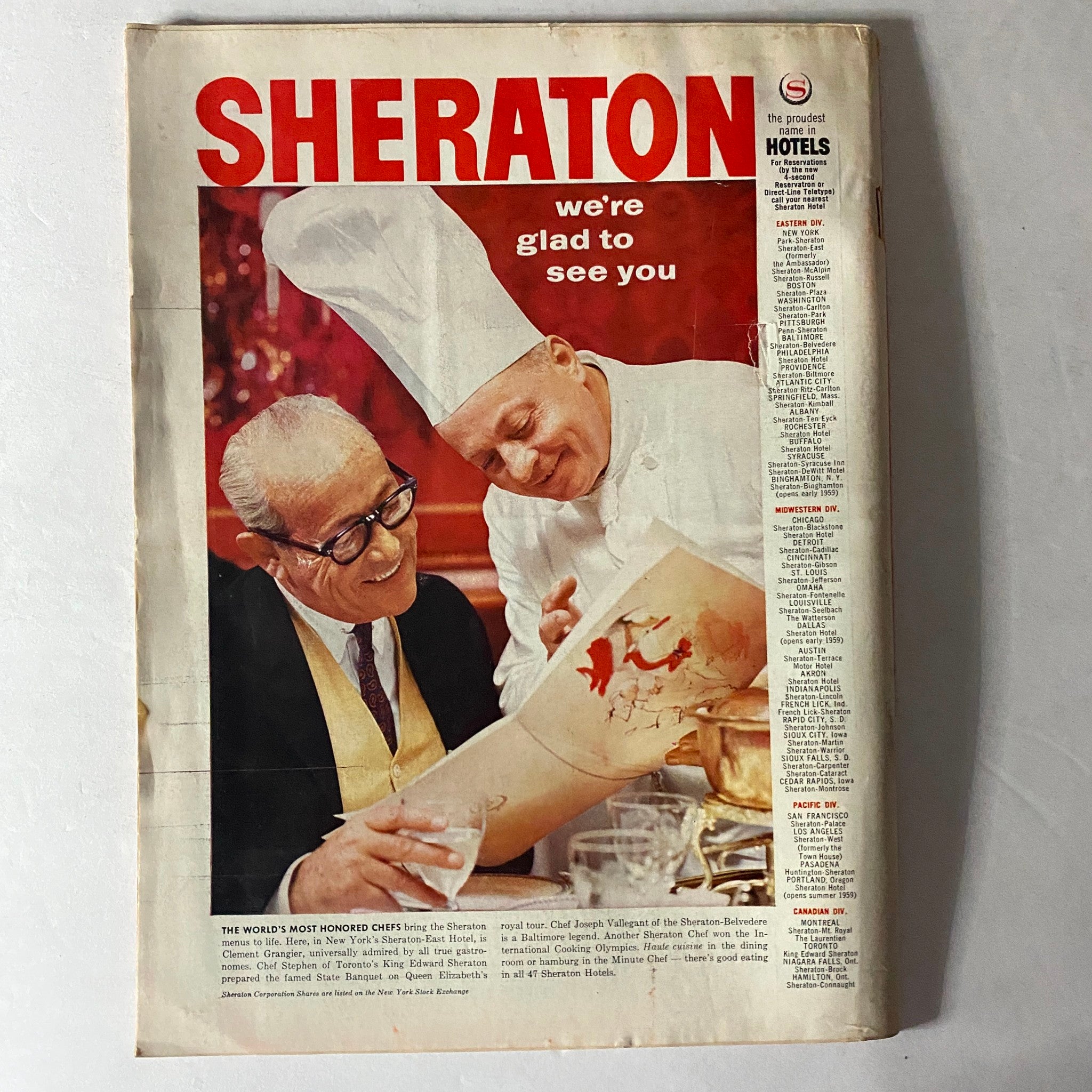 Sheraton magazine cover featuring two chefs, one wearing a chef hat, examining a menu, with text stating 'we're glad to see you', highlighting the hospitality theme.