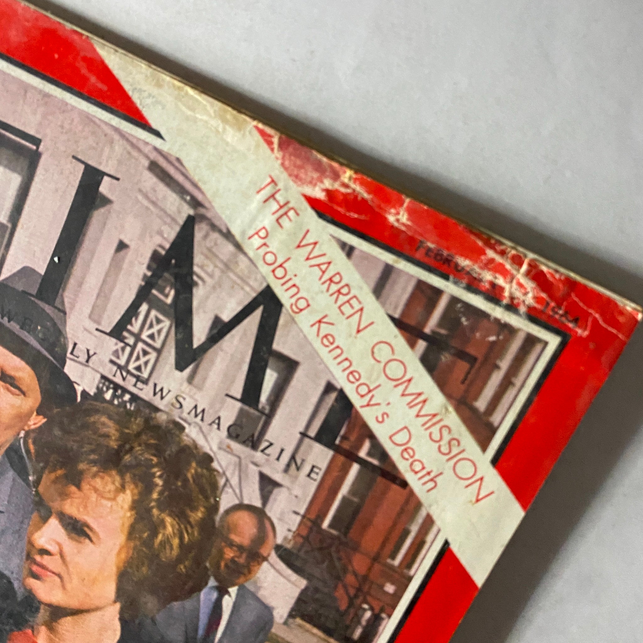 Close-up of the Time Magazine February 14, 1964 cover featuring Marina Oswald, highlighting the title and the tagline about the Warren Commission.