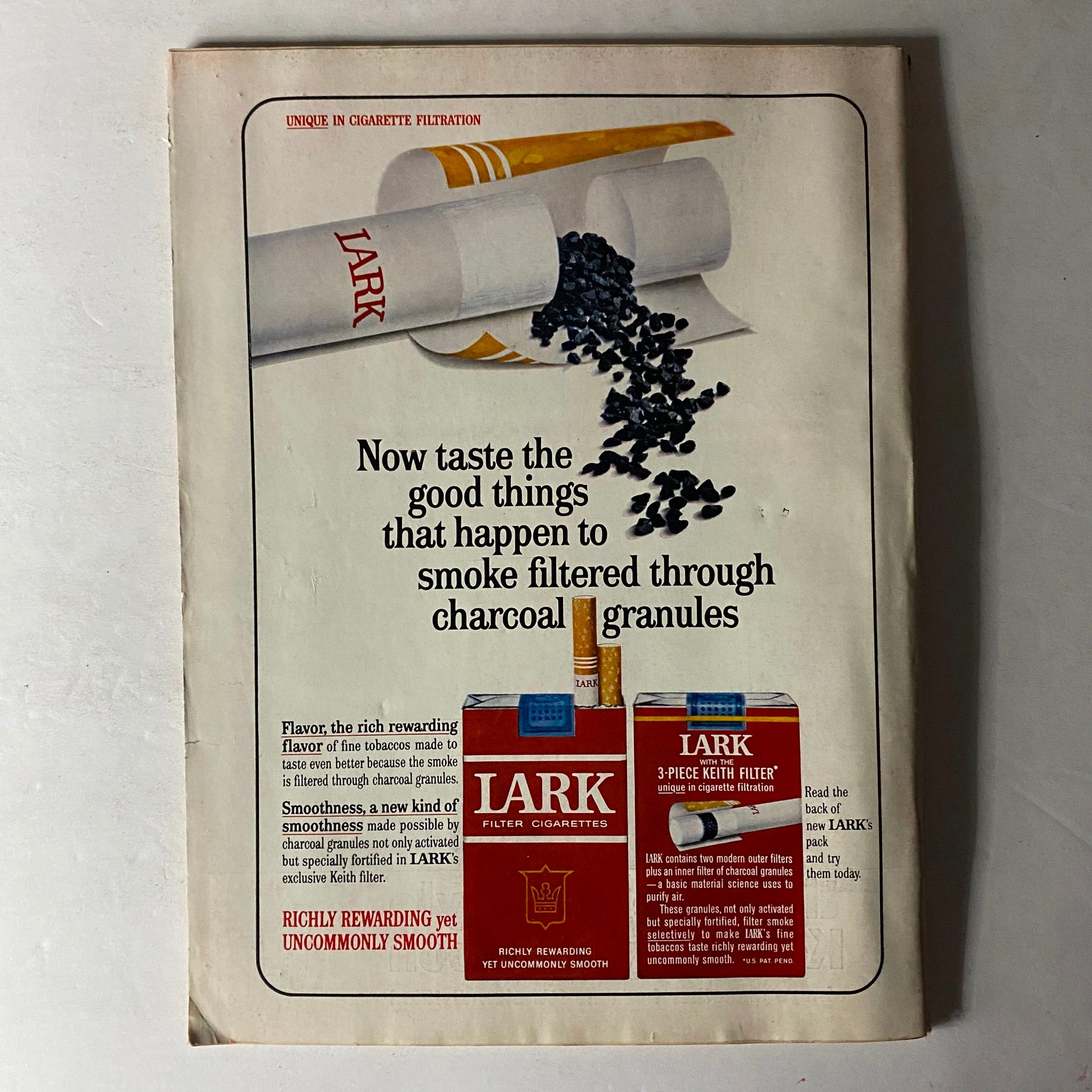 Advertisement page from Time Magazine February 14, 1964 showcasing Lark Filter Cigarettes, highlighting the product and its promotional messaging.