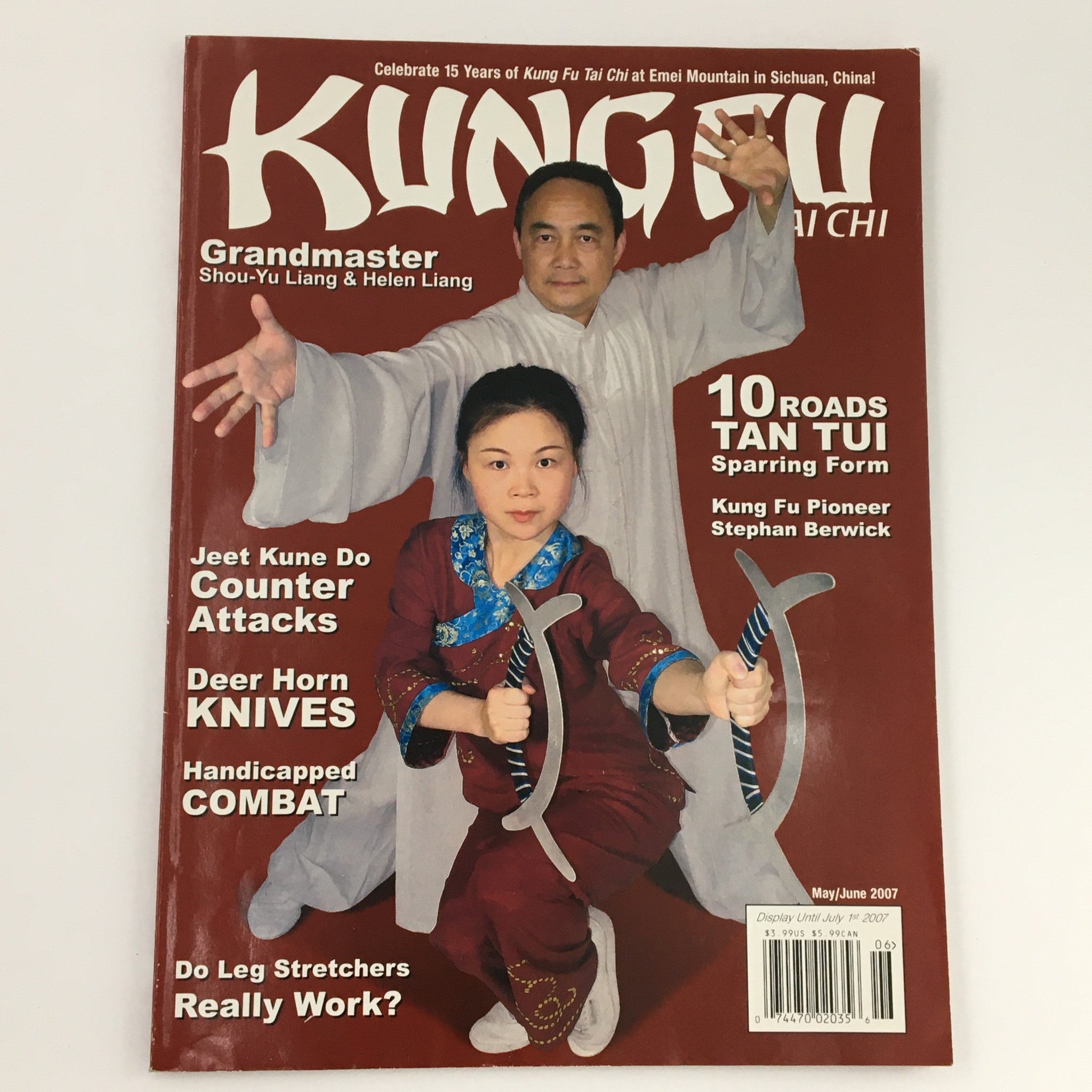 Cover of Kung Fu Tai Chi Magazine May June 2007 featuring Grandmaster Shou-Yu Liang and Helen Liang with striking martial arts poses, showcasing their expertise in Tai Chi and Kung Fu. The magazine includes topics on Jeet Kune Do and Tui Sparring.