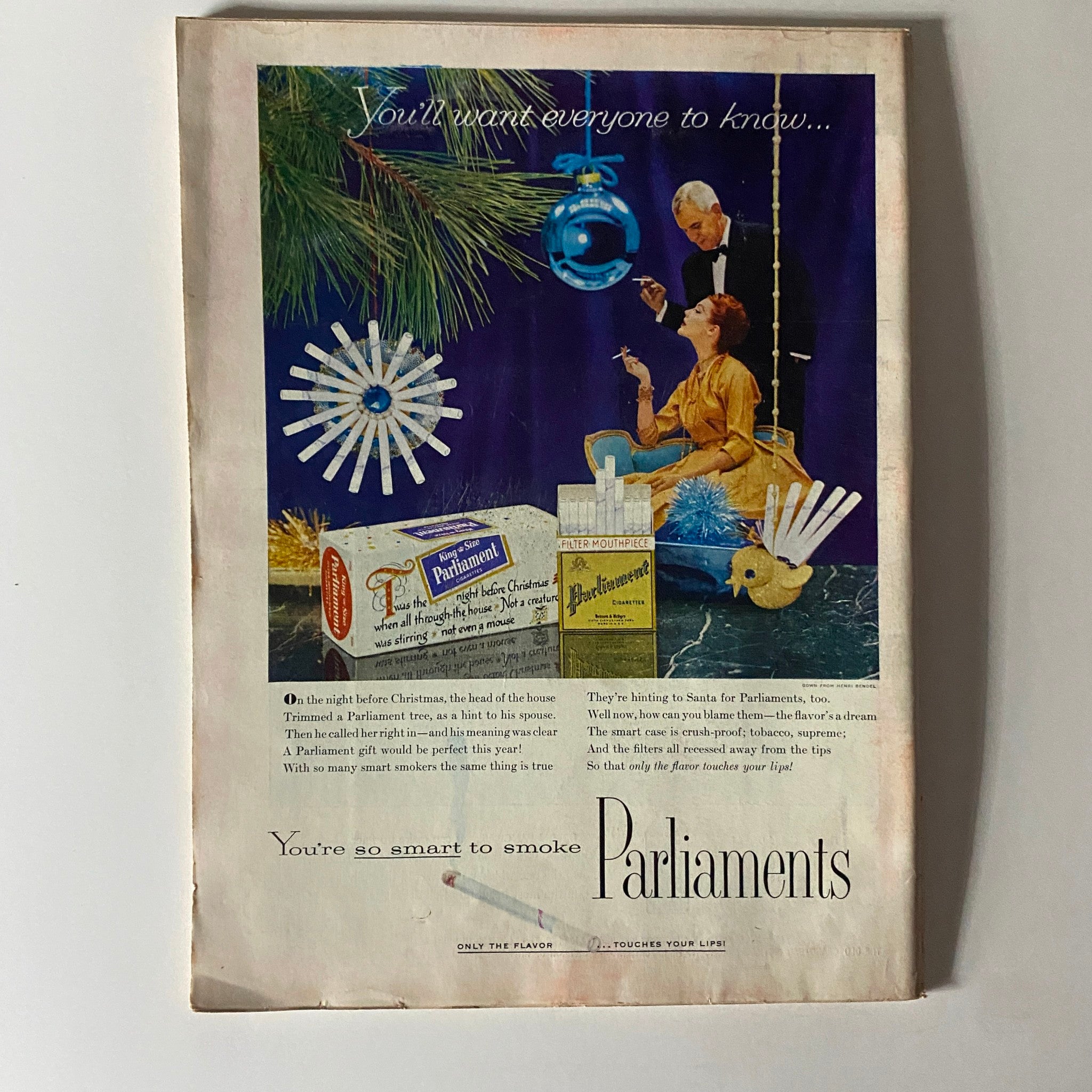 Vintage advertisement from Time Magazine December 19, 1955, featuring a Christmas-themed promotion for Parliament cigarettes, highlighting mid-20th century marketing aesthetics.