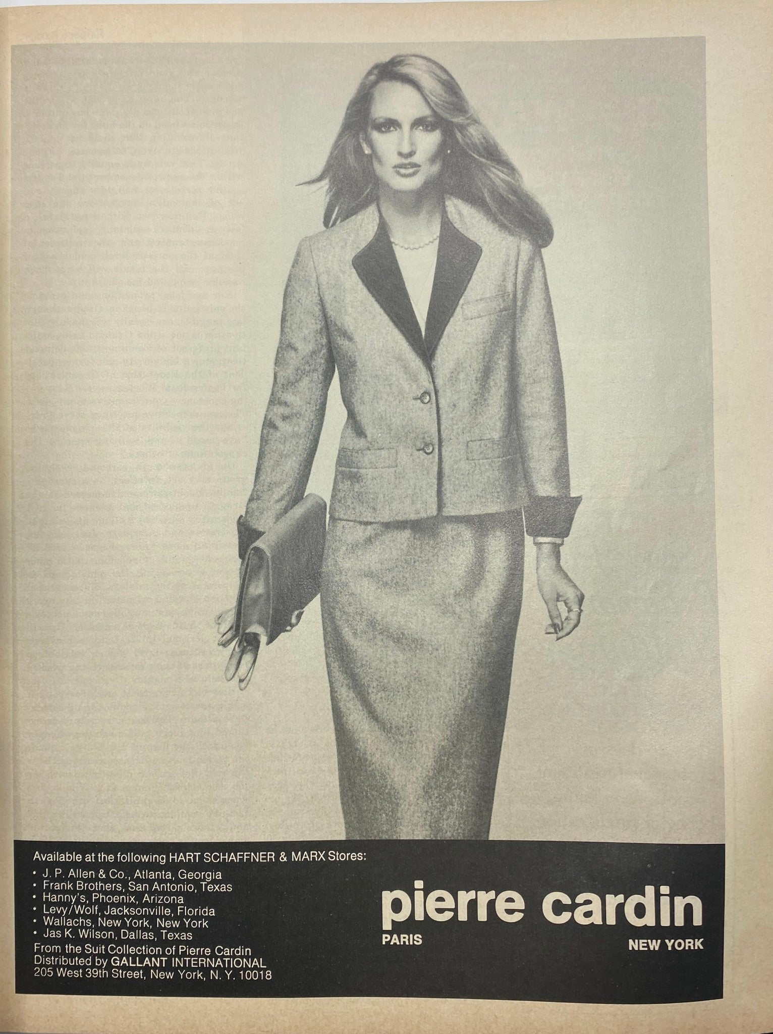 Advertisement for Pierre Cardin showcasing a model wearing a chic suit, illustrating 1980s fashion from Harper's Bazaar Magazine August 1980.