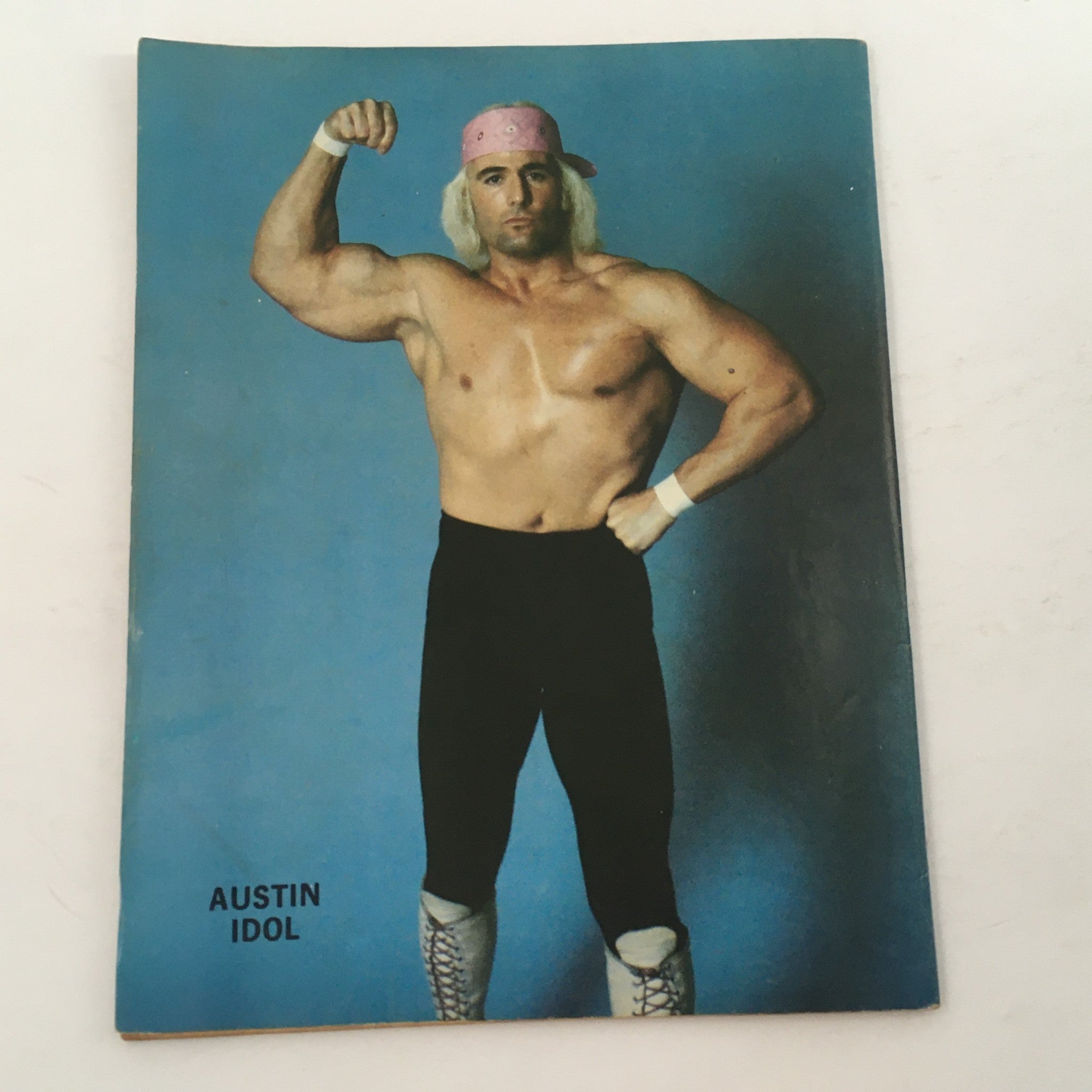 Image of wrestler Austin Idol featured in Wrestling Magazine #71 from 1981, highlighting his iconic look and pose.