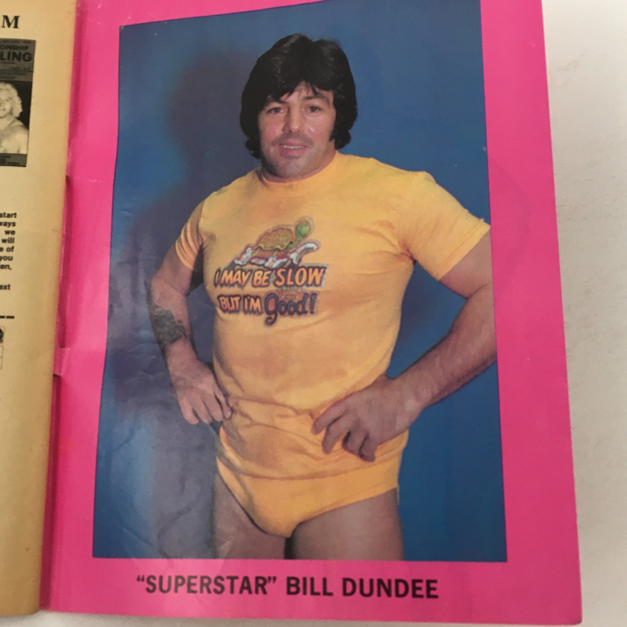 Wrestling Magazine #75 1981 image of 'Superstar' Bill Dundee wearing a humorous t-shirt, striking a confident pose.
