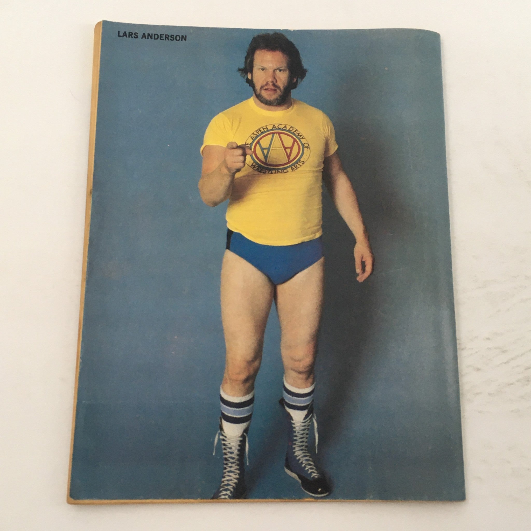 Highlight photo of Lars Anderson from The Ring's Wrestling Magazine December 1980, wearing a wrestling outfit and striking a pose.