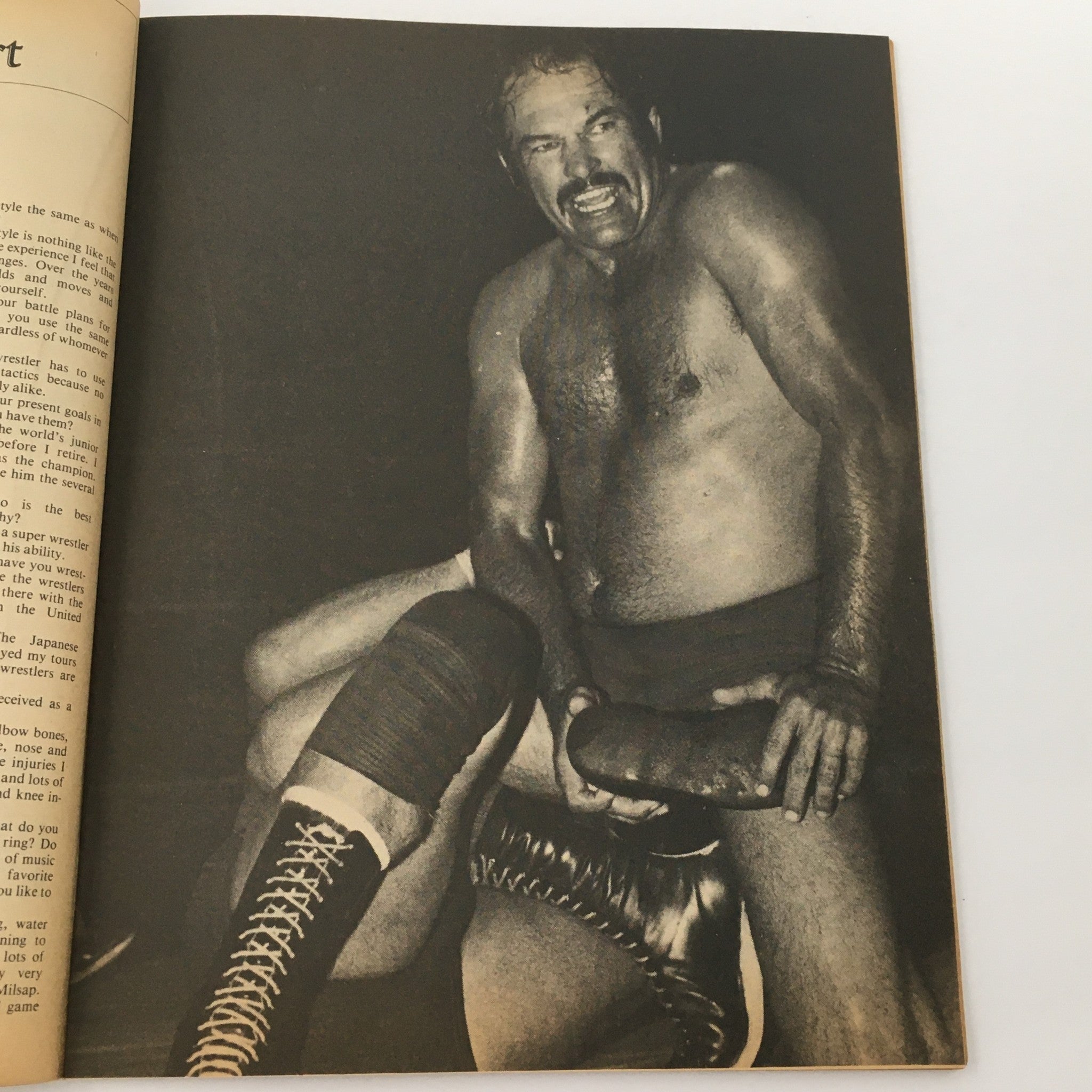 Wrestling Magazine September 1980 featuring Dick Murdock in an action pose during a wrestling match, showcasing the intense atmosphere of professional wrestling.