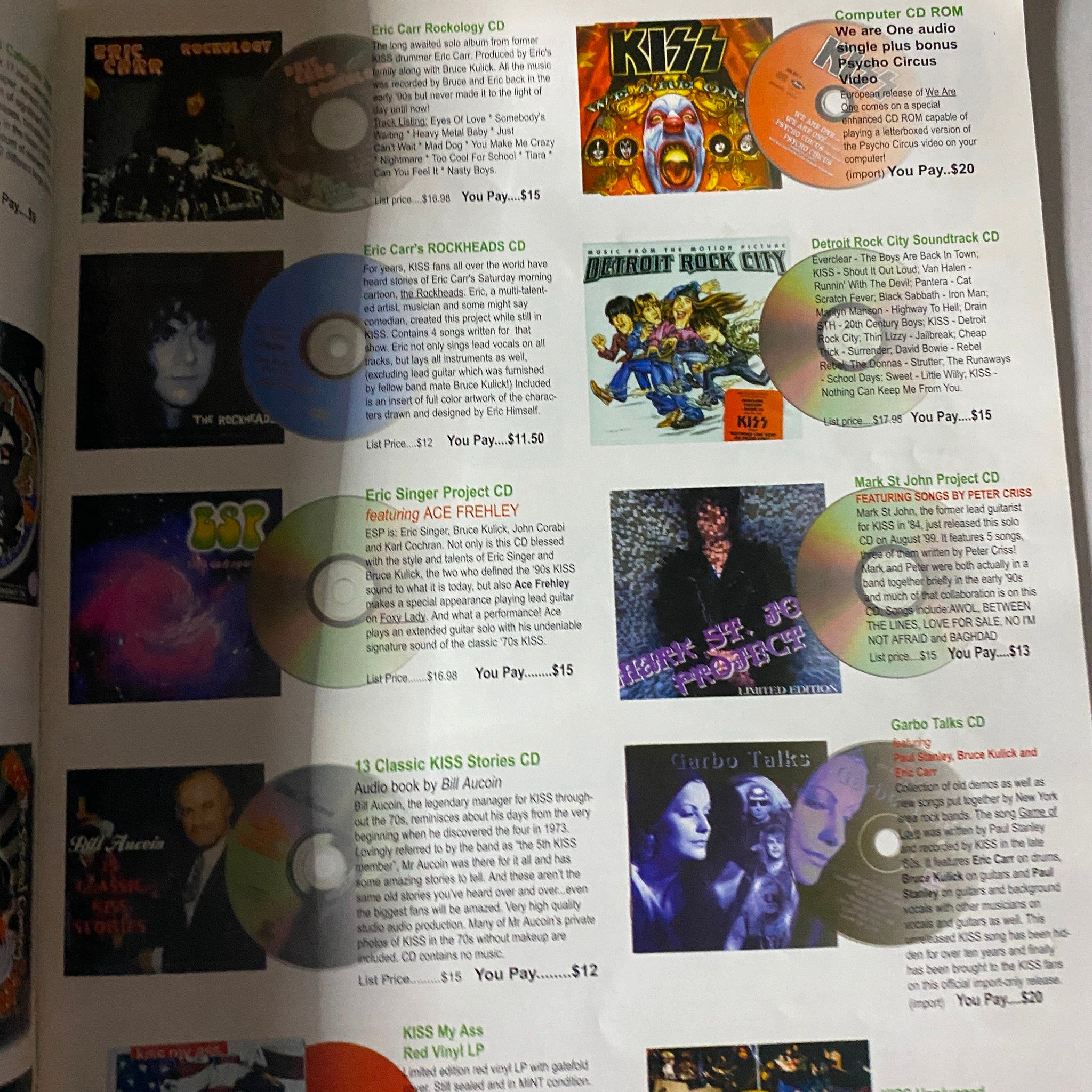 KISS Museum.com Catalog Christmas and New Year's 2000 - Interior page displaying featured KISS CDs and audio releases, highlighting collectible items and prices for fans and collectors.