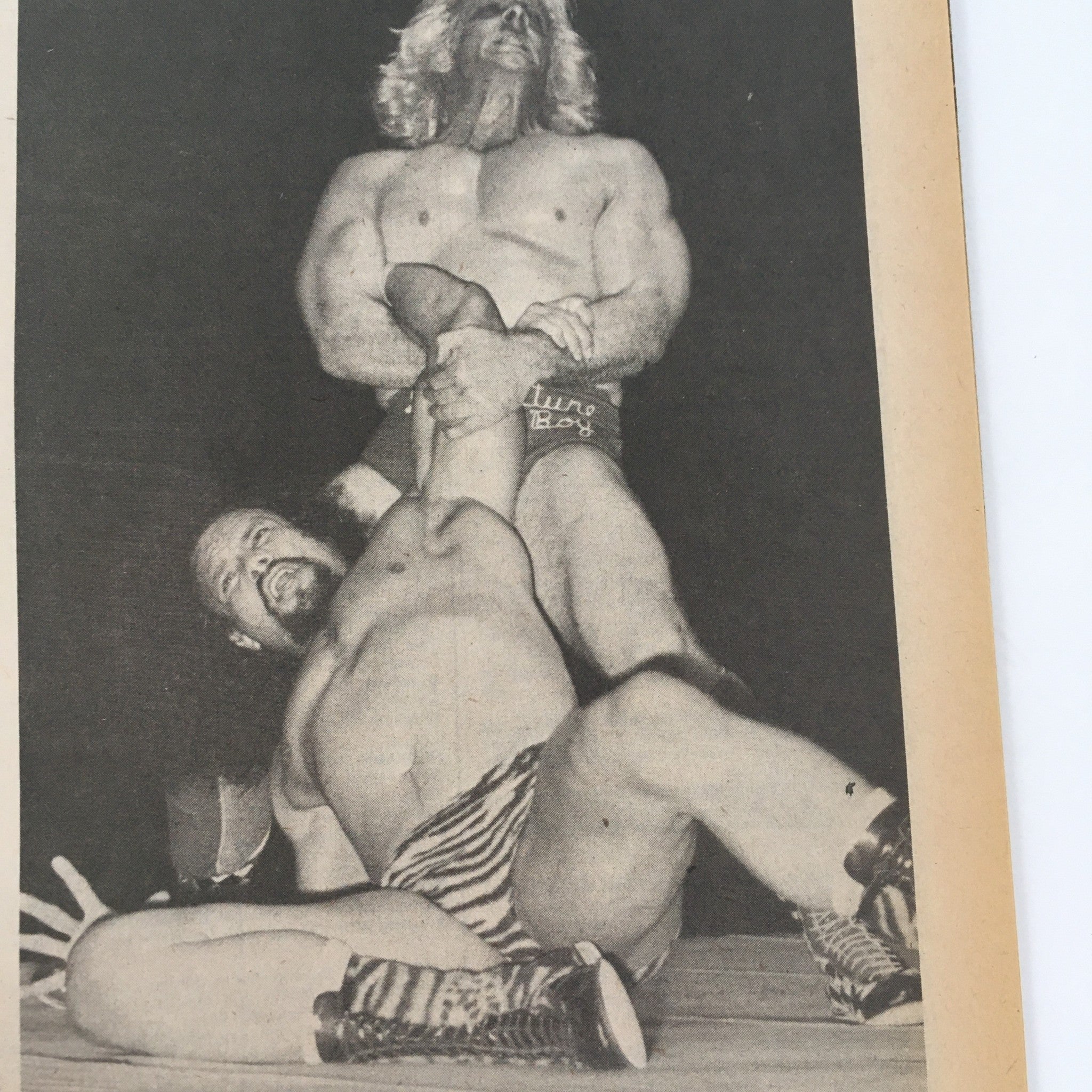Black and white image from The Wrestler Magazine February 1981 featuring a wrestling match scene with action between two wrestlers.