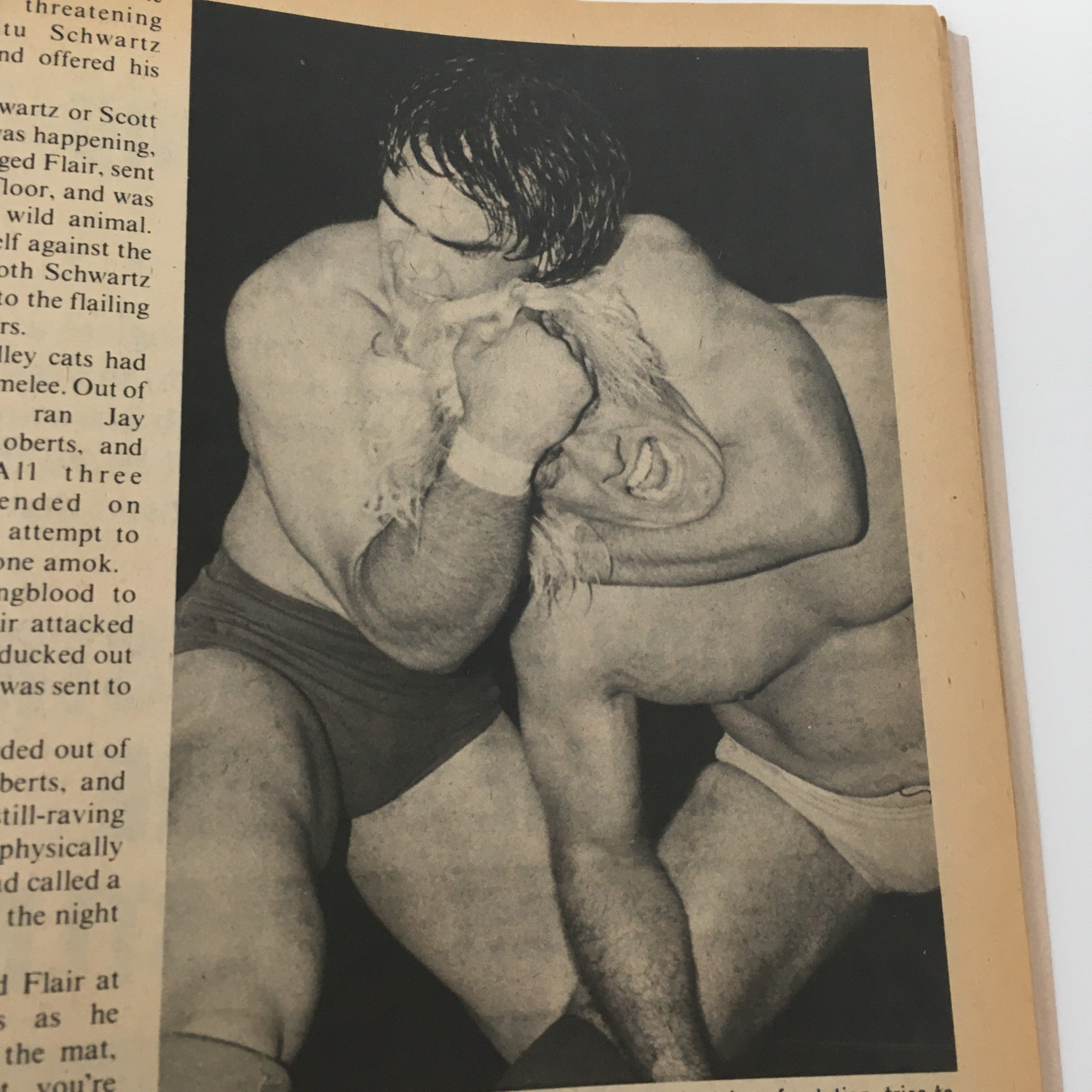 The Wrestler Magazine June 1982 showcasing an intense wrestling match action between Ric Flair and Rick Steamboat, highlighting their rivalry in a classic wrestling scene.