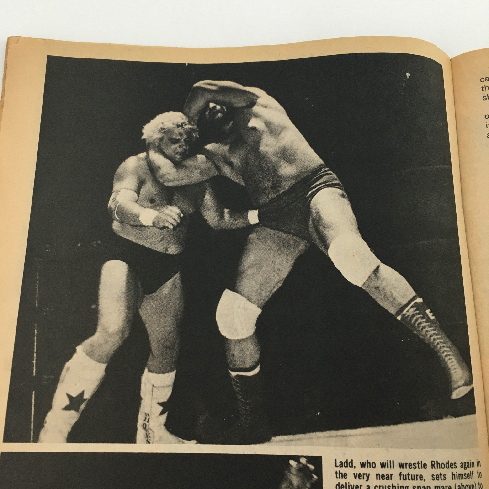 Black and white action shot from The Wrestler Magazine February 1979 depicting a wrestling match, featuring wrestlers Dusty Rhodes and Ernie Ladd in action.