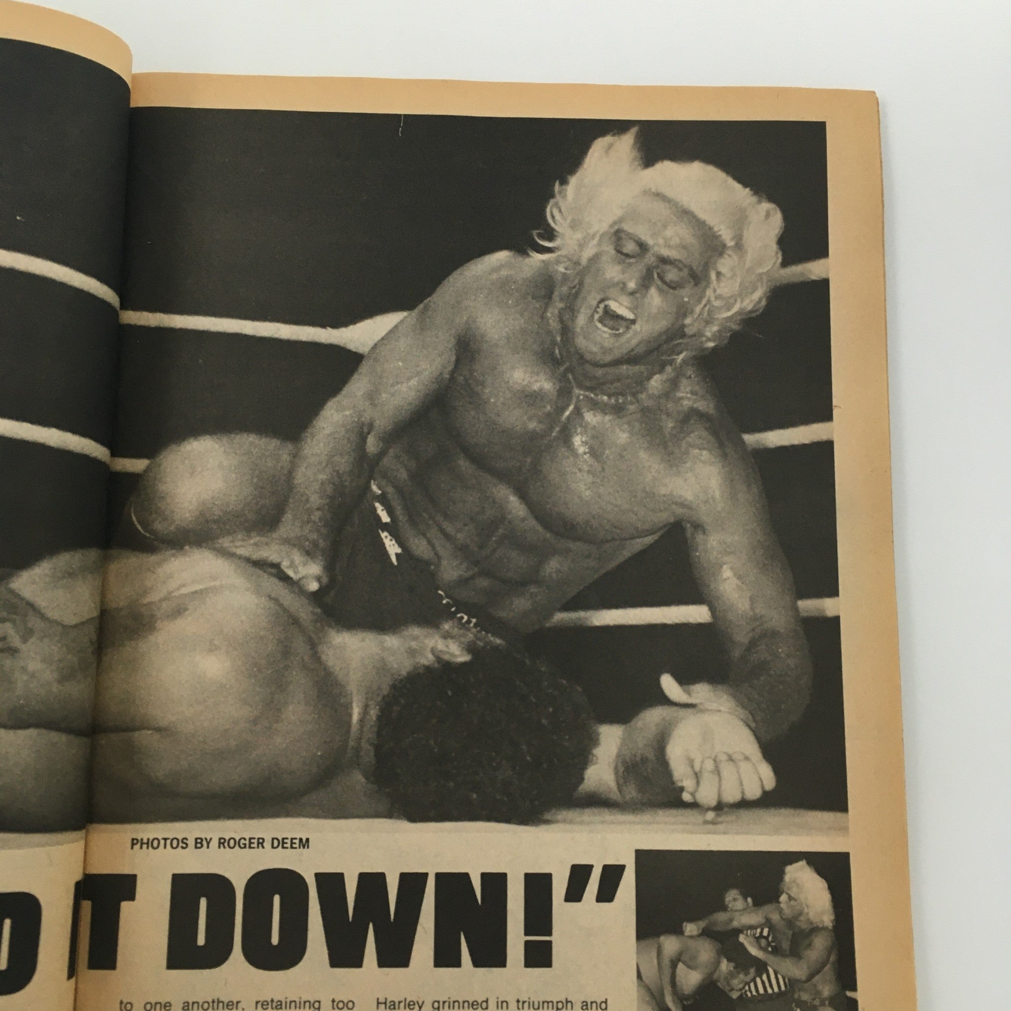 Dynamic wrestling scene illustrated in The Wrestler Magazine February 1979 showing Ric Flair in a competitive moment during a match.