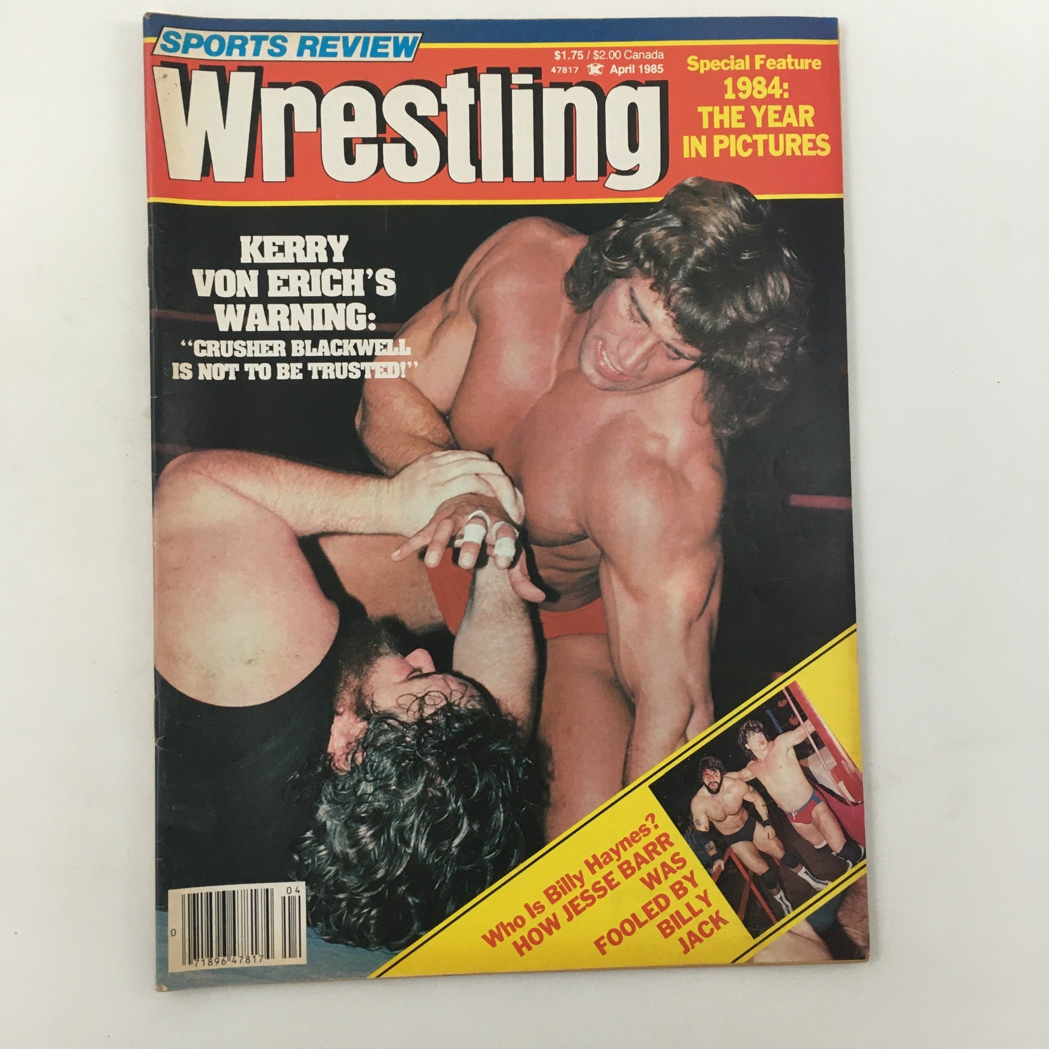 Sports Review Wrestling Magazine April 1985 cover featuring Kerry Von Erich and Crusher Blackwell in a grappling scene.