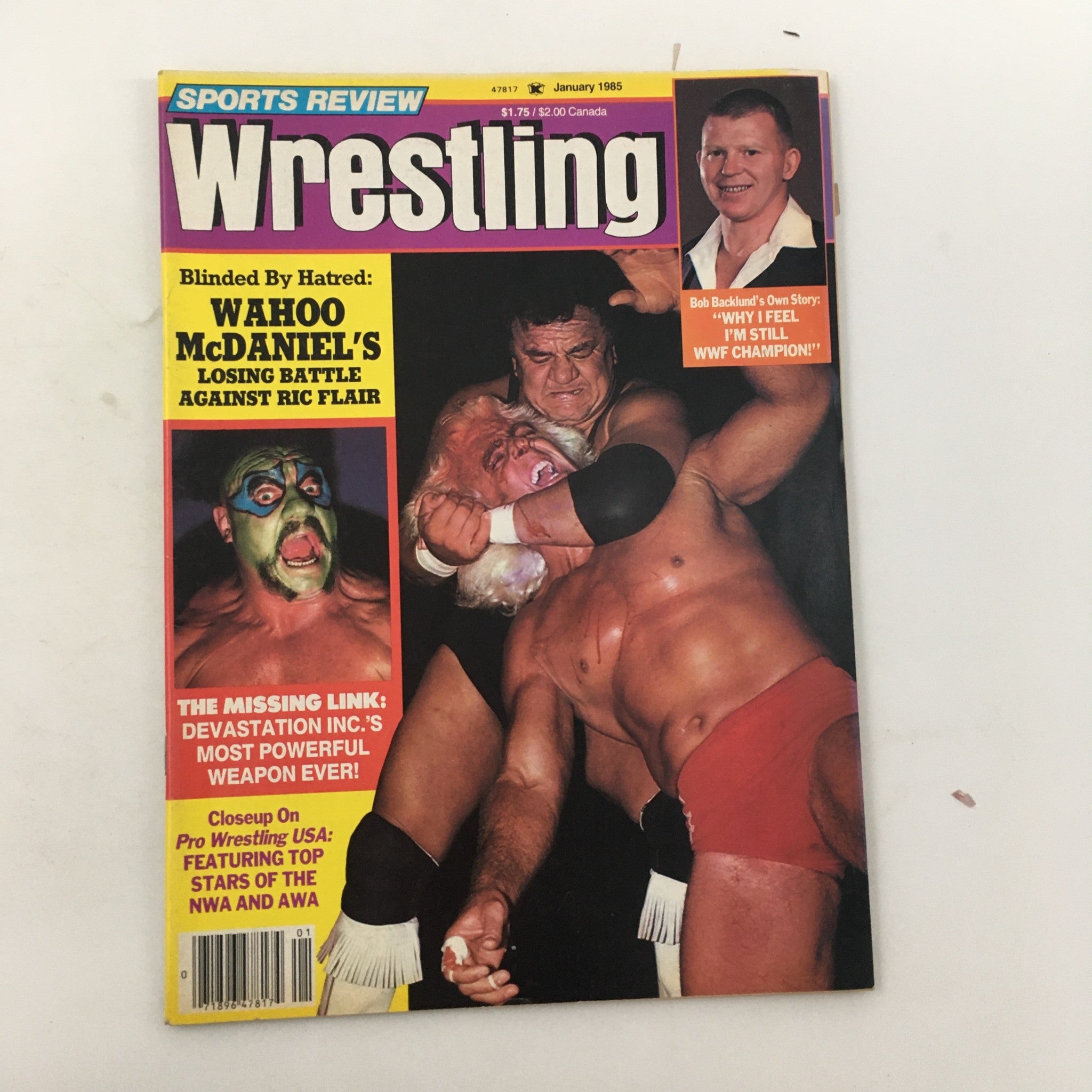 Cover of Sports Review Wrestling Magazine January 1985 featuring Wahoo McDaniel vs Ric Flair, showcasing a dramatic wrestling moment.