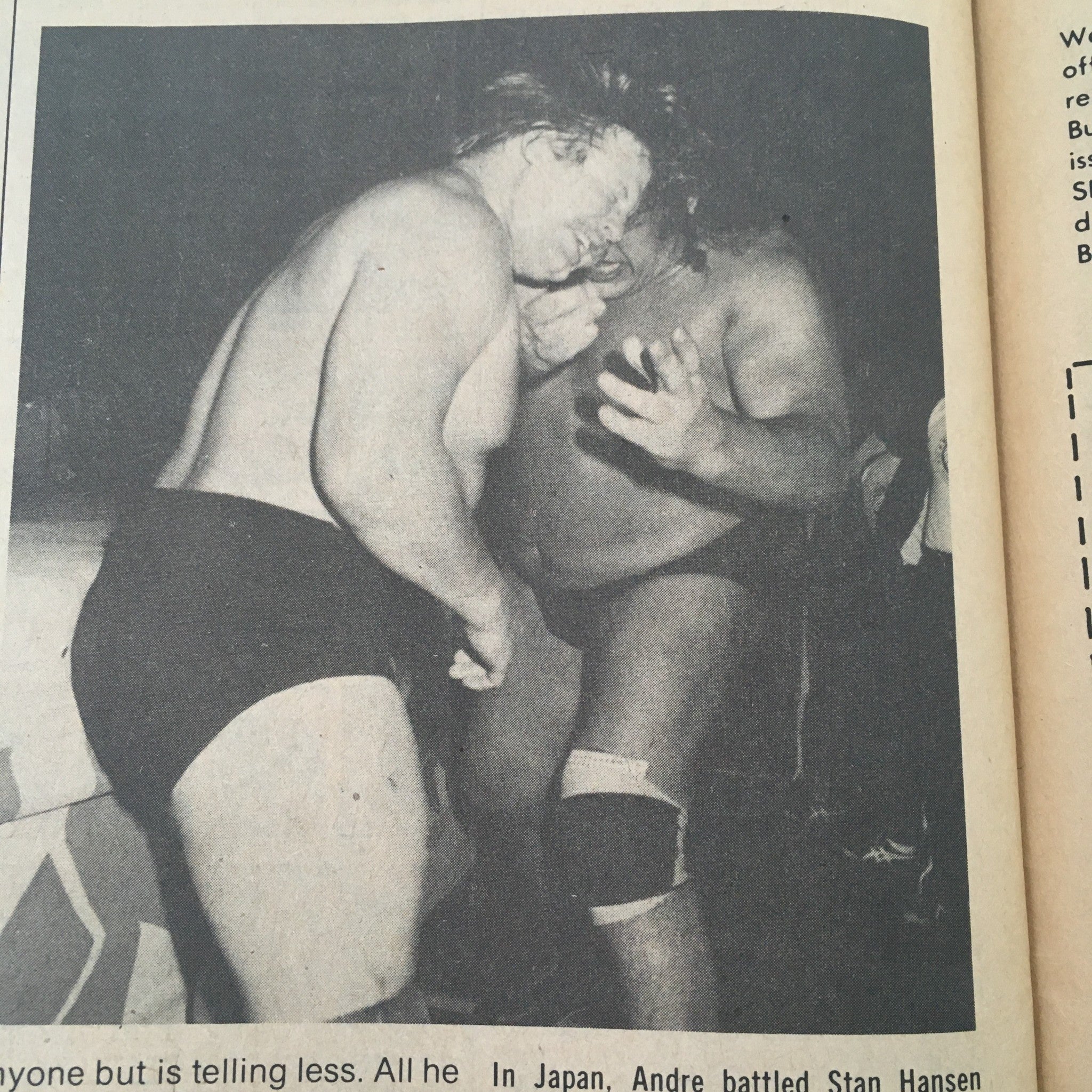 Action shot from Sports Review Wrestling Magazine April 1980, depicting two wrestlers in a match. This vintage image captures the intensity of wrestling during the golden age of sports entertainment.
