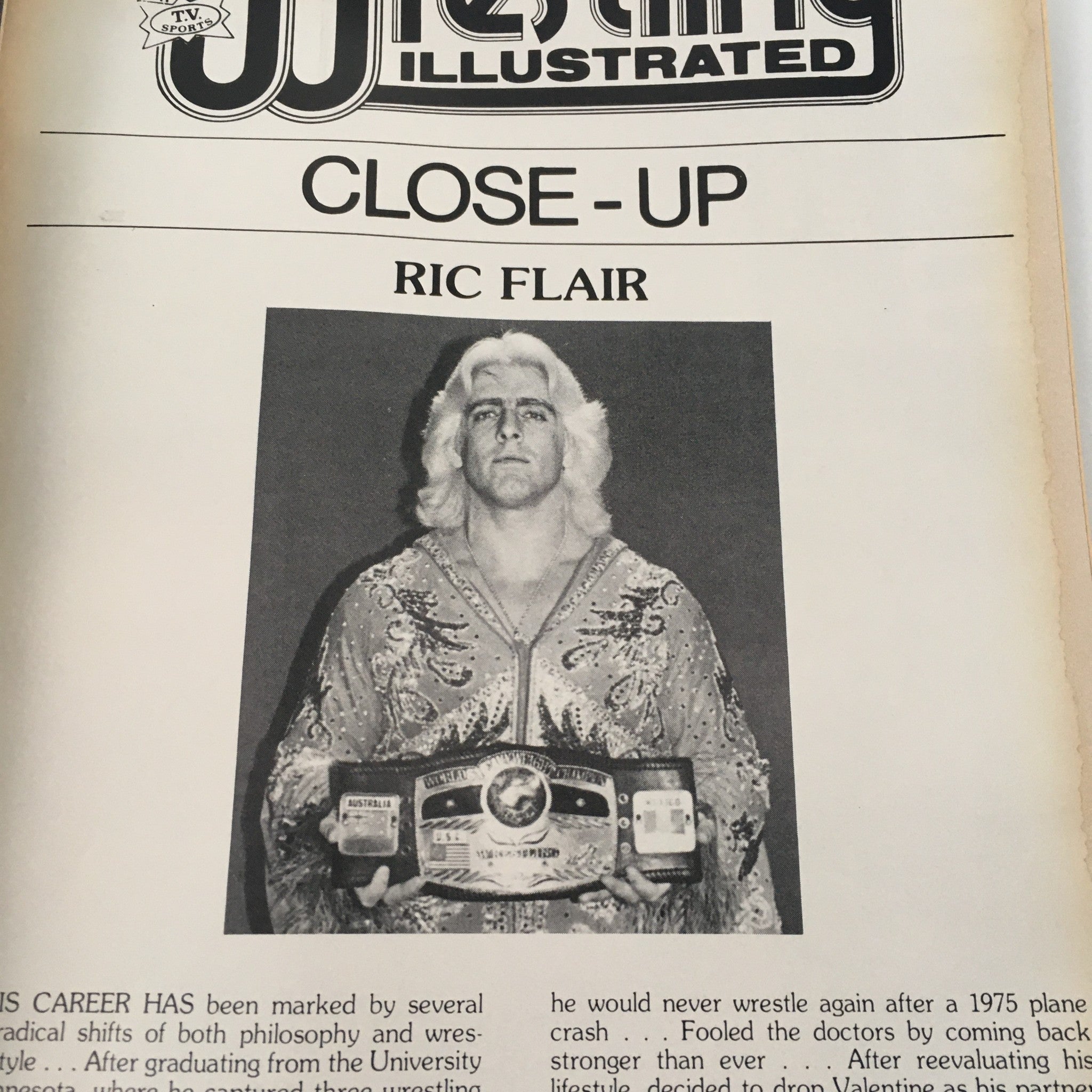 Close-up image of Ric Flair featured in Pro Wrestling Illustrated Magazine May 1982, showcasing his wrestling career and championship belt.
