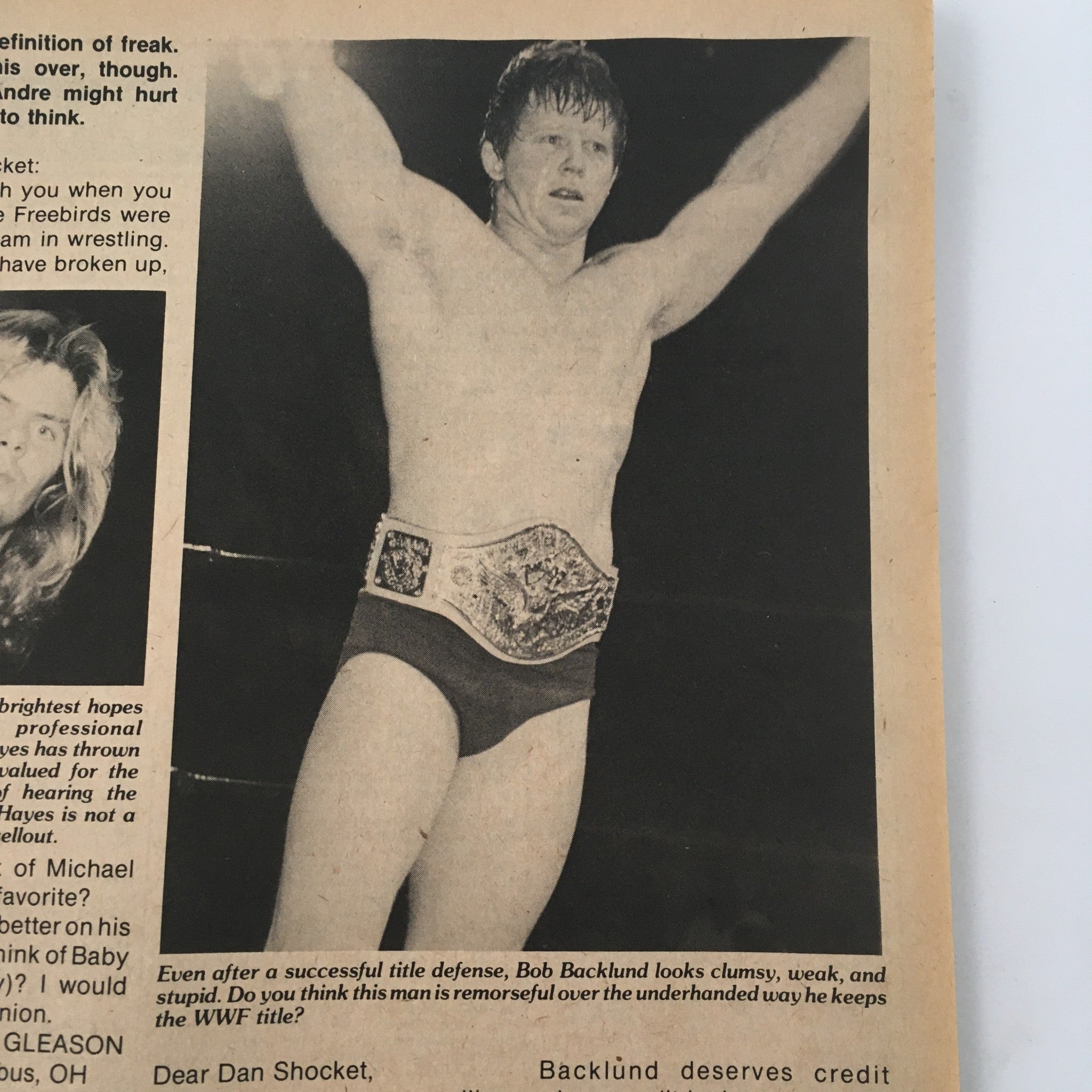 Bob Backlund celebrating a victory with his championship belt, highlighted in Pro Wrestling Illustrated Magazine May 1982, discussing his wrestling style.