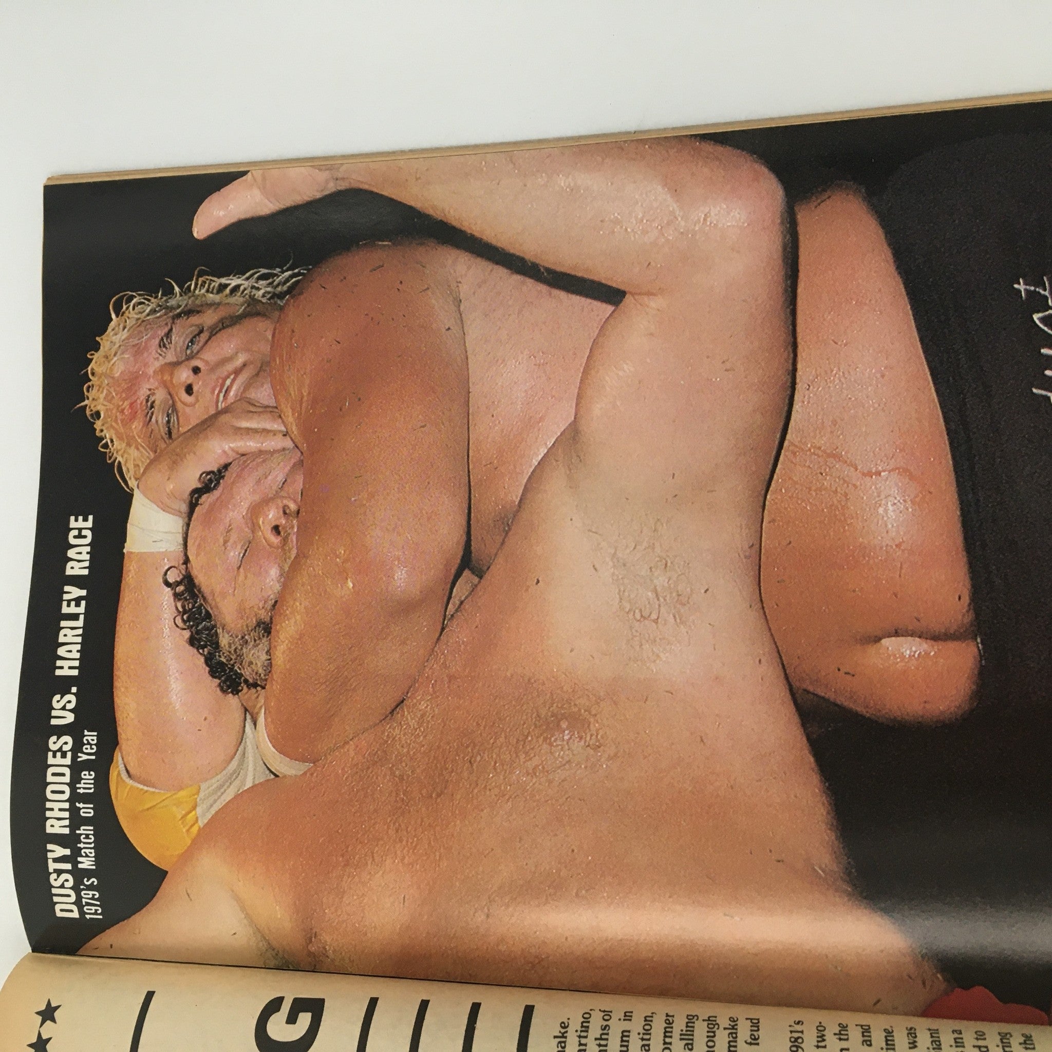 Image of Dusty Rhodes and Harley Race from a featured match in Pro Wrestling Illustrated Magazine Spring 1983, showcasing wrestling history.