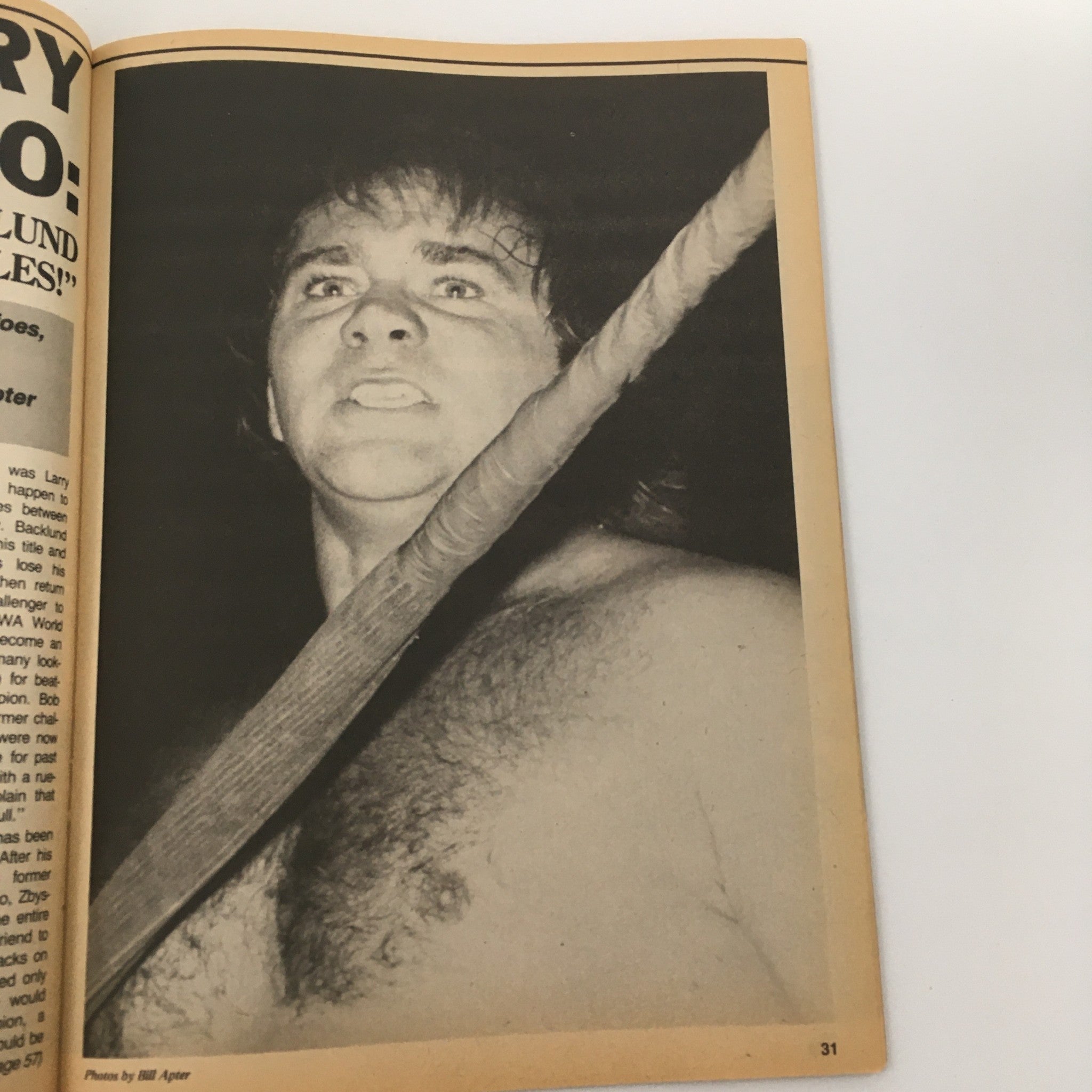 An interior page from The Wrestler Magazine June 1985 showcasing a wrestling photo and article about professional wrestling news.