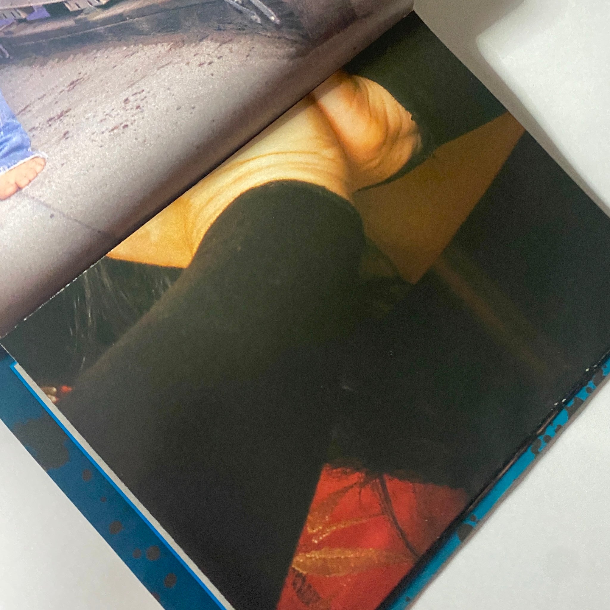 Interior image from Metal Edge Magazine May 2004, showing a close-up of an artistic photo, possibly from a concert or personal collection.