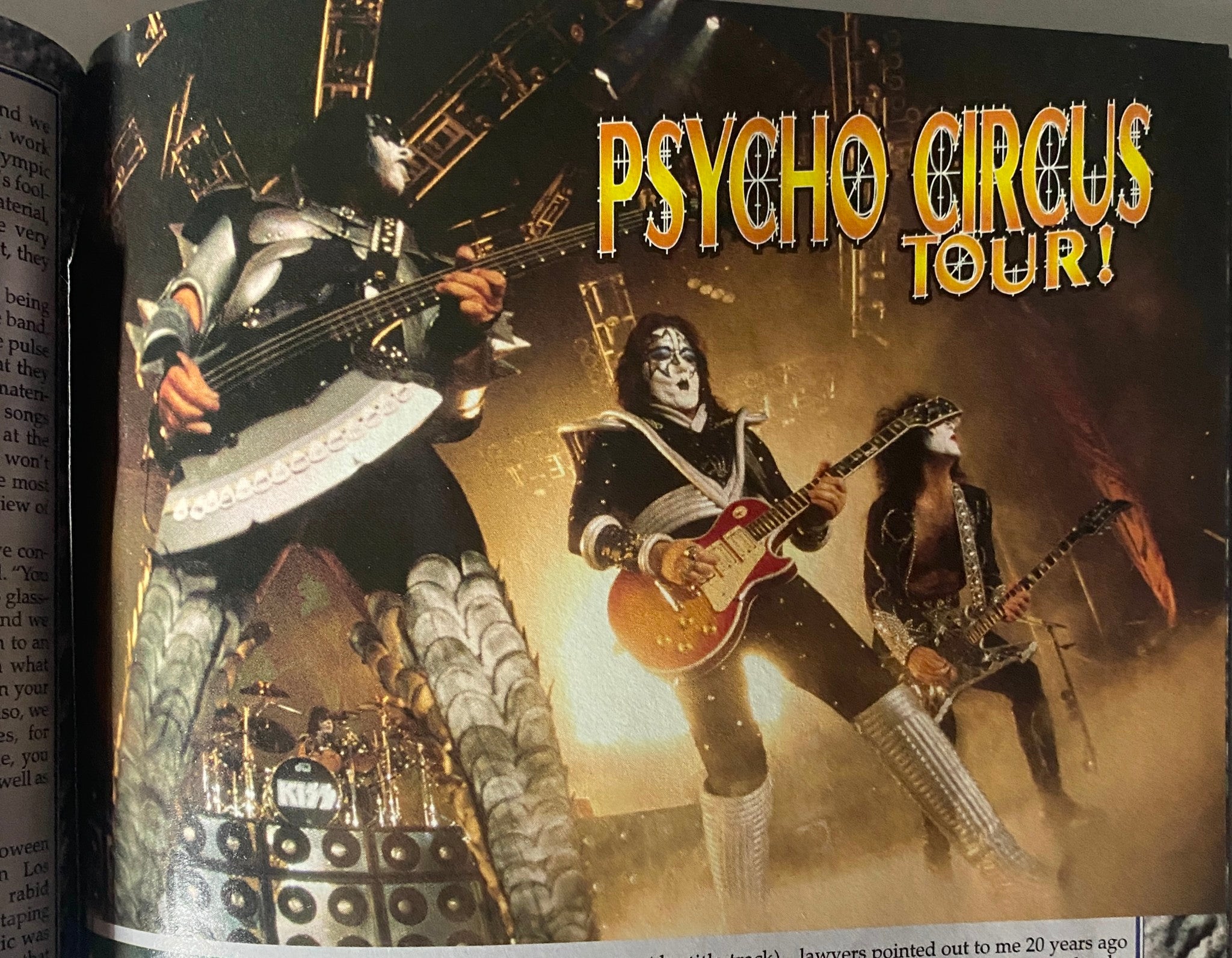 Page from the Official KISS Magazine 1999 Issue #2 showcasing the 'Psycho Circus Tour' with KISS band members performing on stage.