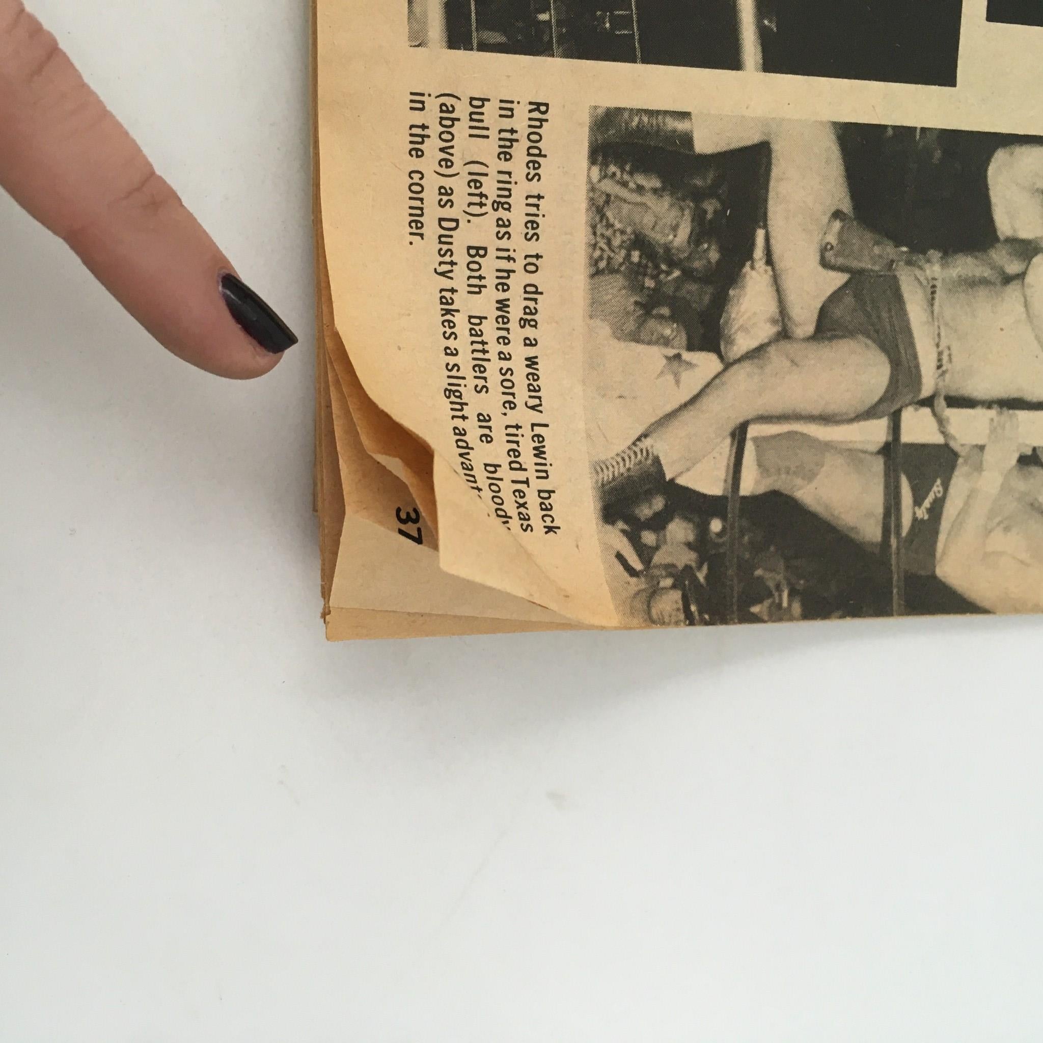 Sports Review Wrestling Magazine January 1982 displaying a torn edge on a page, illustrating the magazine's age and history as a treasured collectible.