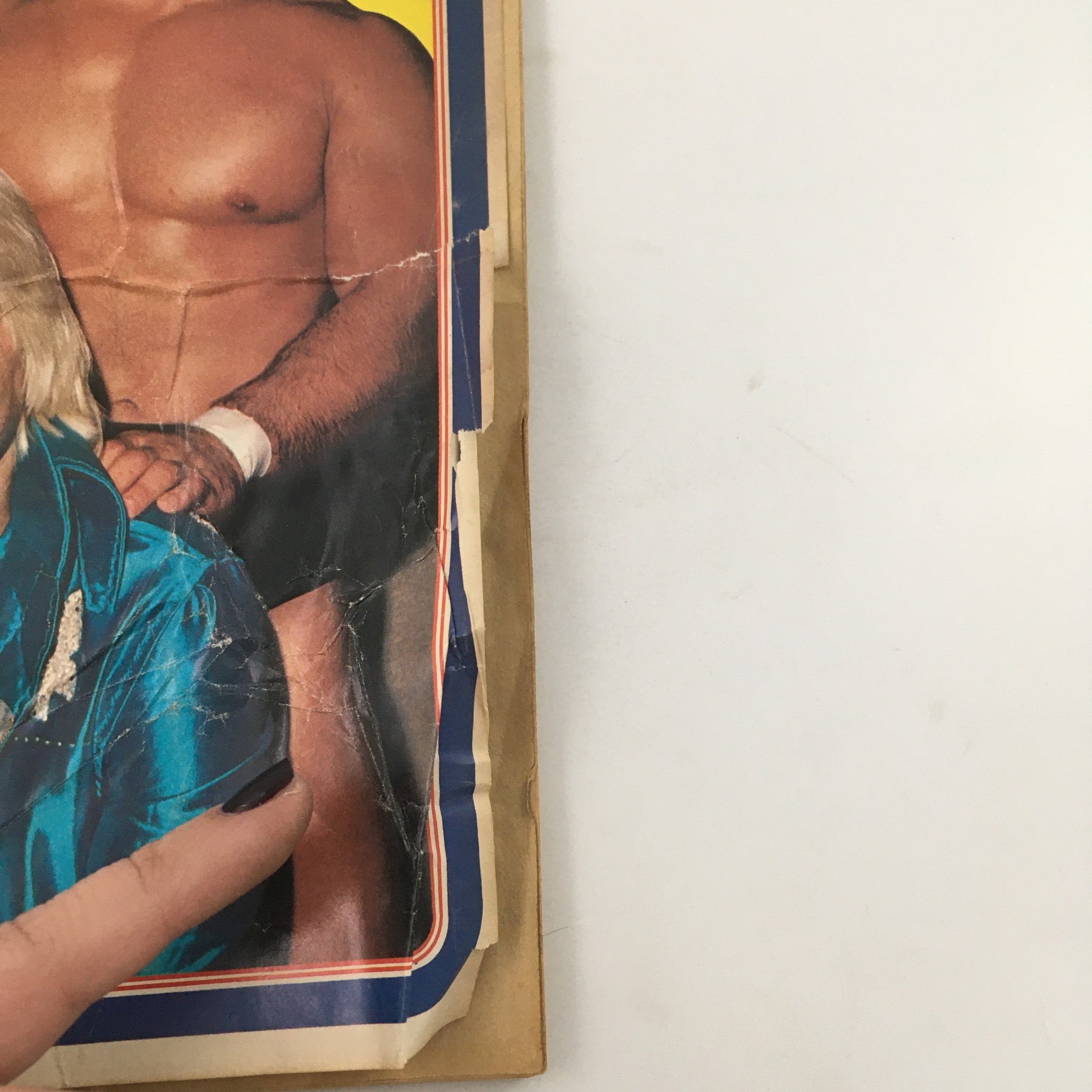 Side view of the back cover of Pro Wrestling Illustrated Magazine August 1982, displaying some wear and tear along with wrestler highlights.