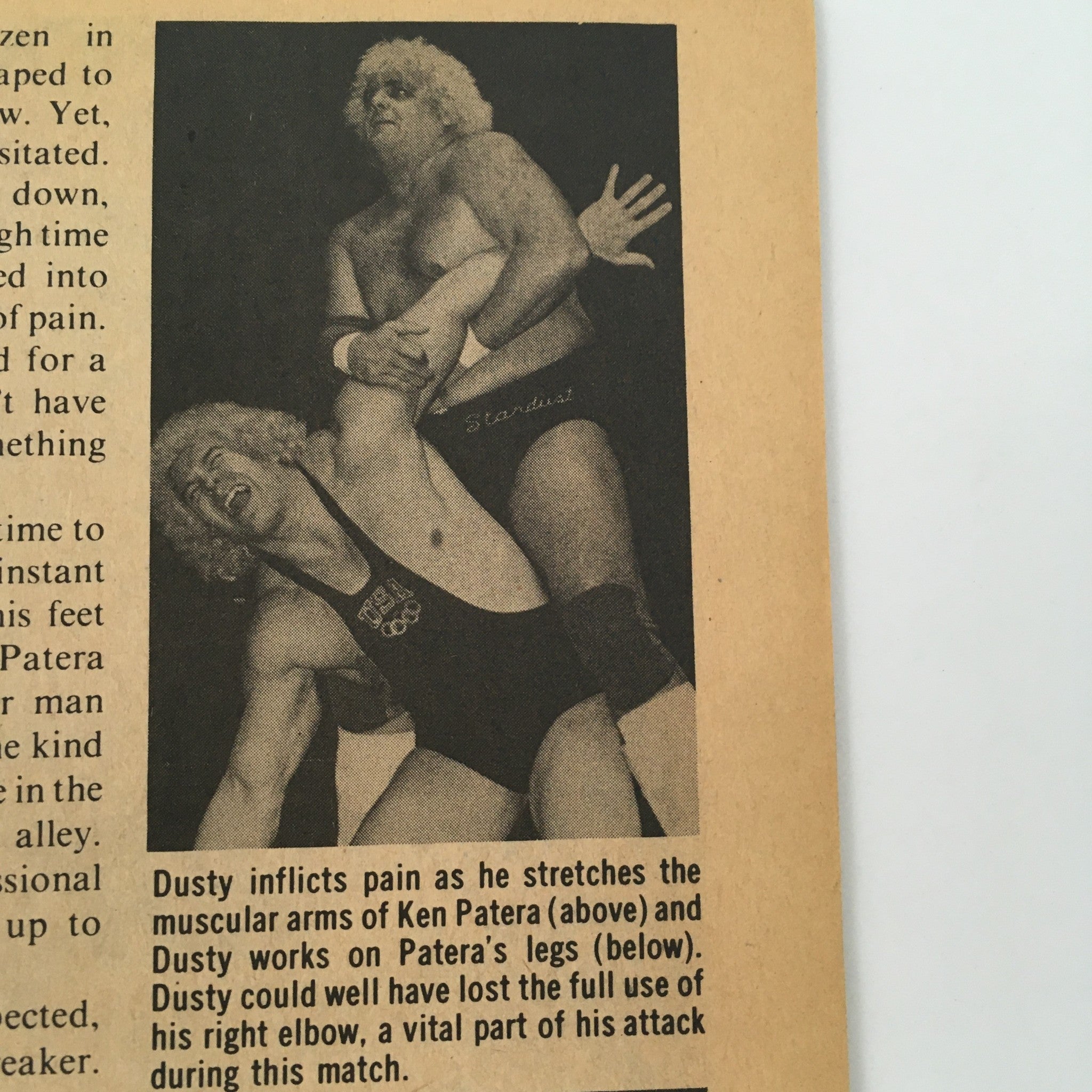 An interior page from The Wrestler Magazine April 1980 illustrating a wrestling match with Dusty Rhodes inflicting a submission hold on Ken Patera.